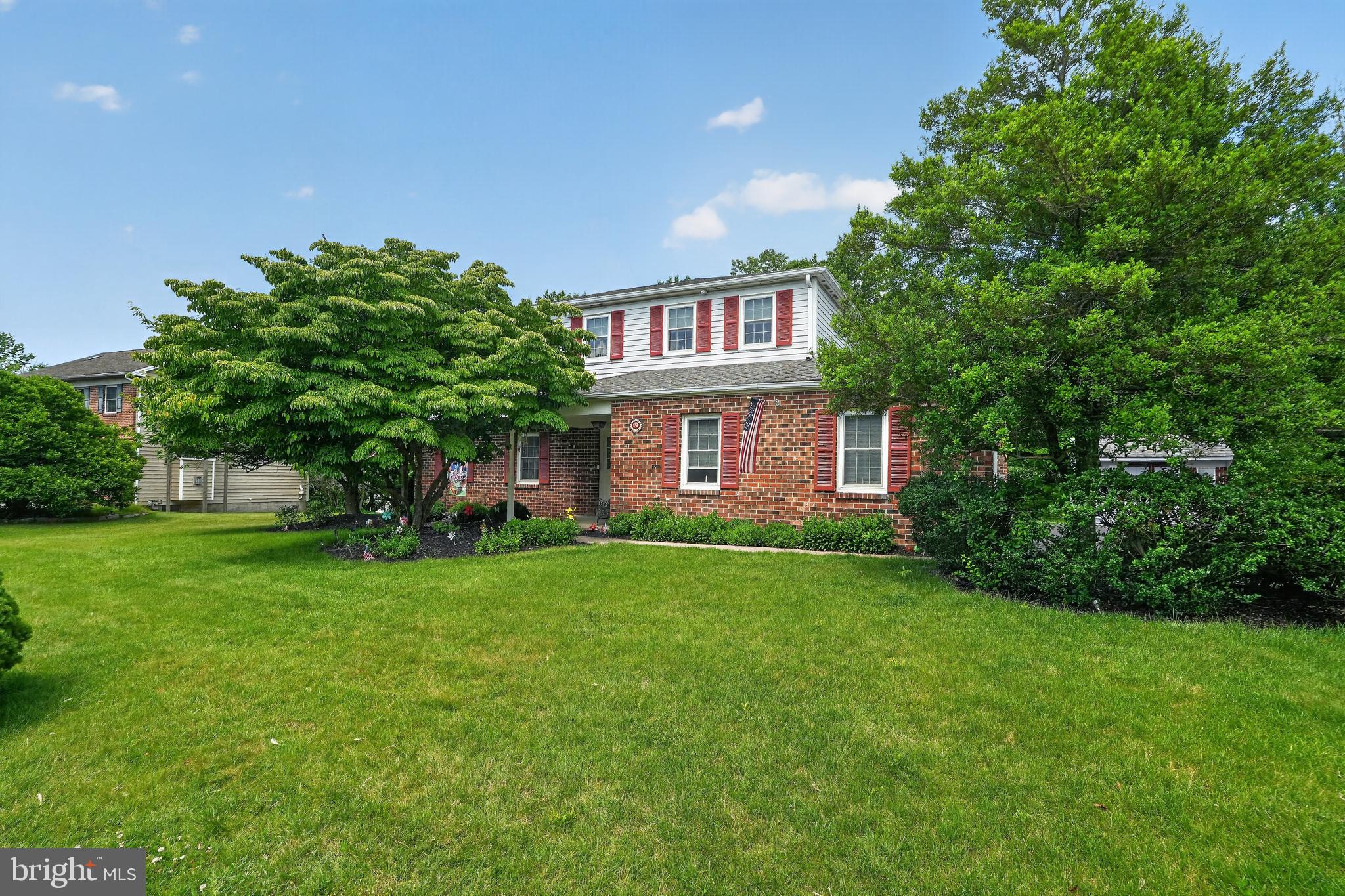 Welcome to 3025 Green Ridge Drive in East Norriton Township — a nature lover’s dream!  Nestled on a beautiful lot backing to preserved wooded land, this well-maintained 4-bedroom, 2.5-bath brick colonial offers privacy, space, and timeless charm.

A welcoming front covered porch sets the tone as you enter into a large entry foyer with coat closet, creating an inviting first impression. Inside, you’ll find spacious rooms throughout, including a bright formal living room and dining room—perfect for entertaining. The eat-in kitchen offers good cabinet and counter space, features an electric stove, and provides a comfortable layout for everyday living. Just steps down, the inviting family room showcases a classic brick fireplace (currently equipped with an insert) and French doors leading to the rear deck—an ideal spot to relax and enjoy the peaceful, wooded backdrop. Ceiling fans are featured throughout the home for added comfort.

Convenience abounds on the main level with a laundry room, powder room, and direct access to the attached 2-car garage. The oversized driveway offers ample parking, and an additional shed provides extra storage.

Upstairs, you'll find four generously sized bedrooms, including the primary suite with a spacious closet and private bathroom with shower. A full hall bath with shower/tub combination completes the second level.

The finished basement expands your living space with endless possibilities—perfect for a home office, game room, playroom, or gym—and includes a large closet/pantry for added storage. A separate HVAC room offers even more storage, and the system was updated in 2022.

Surrounded by natural beauty and thoughtfully designed for comfortable living, this home is truly a special find. Don’t miss your opportunity—this one won’t last!