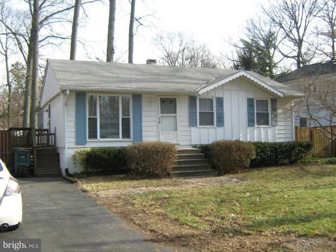 Solid rancher on level lot with 3 bedrooms, 2 baths (2 bedrooms, 1 bath upstairs and 1 bedroom, 1 bath down).  Large sunroom , shed and fully fenced yard with ample parking.  Walk to the water and community pool.