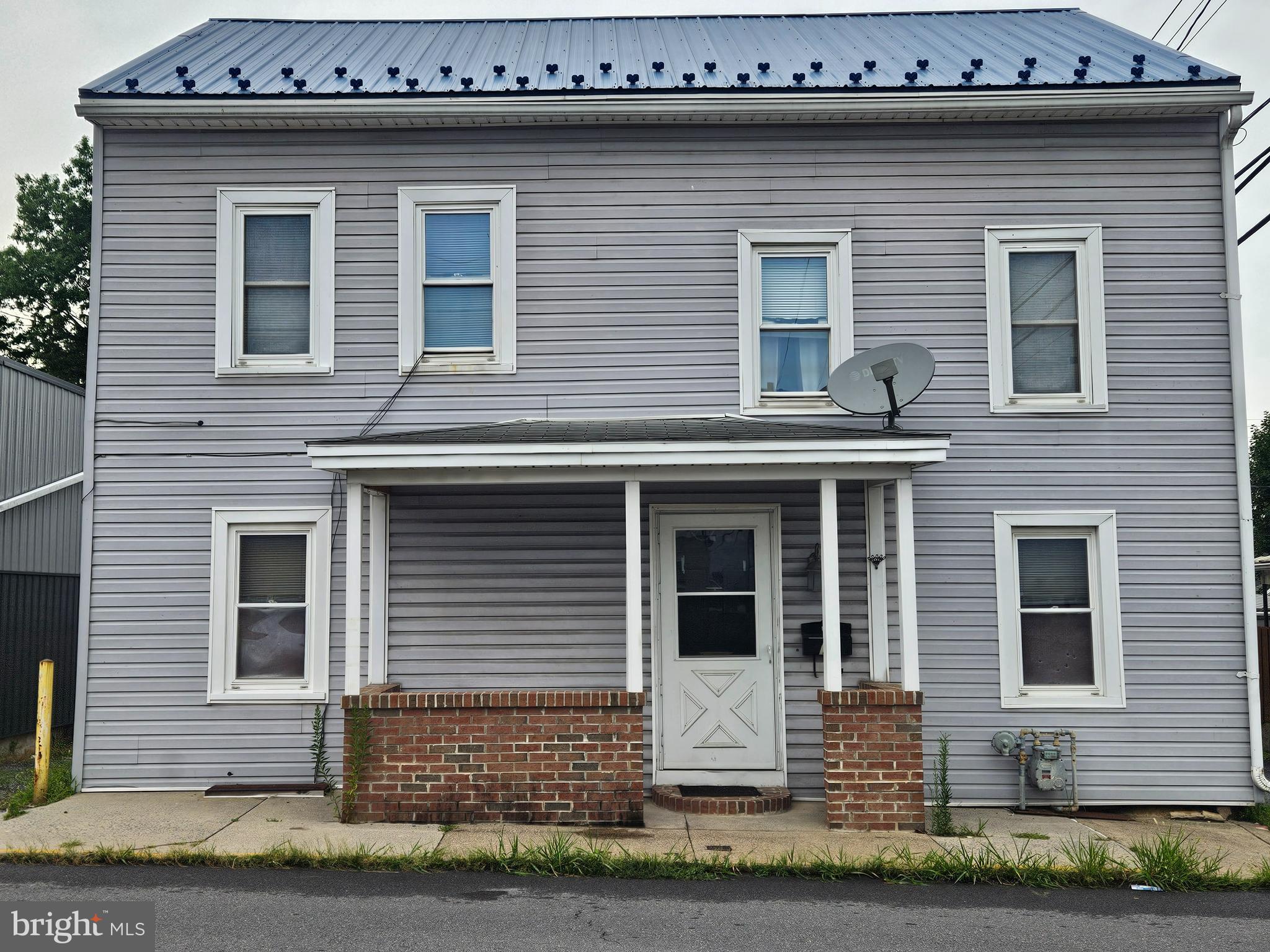This home features 5 bedrooms and 2 full bathrooms, with a bathroom conveniently   located on both the first and second floors. All 5 bedrooms are situated on the second floor. The main level includes a spacious living room, dining room, and a kitchen, as well as an additional versatile room off the kitchen that can be used for storage or tailored to your specific needs.
 Outside, the property offers a fenced-in yard for privacy, along with both a covered deck and a covered patio-perfect for enjoying outdoor cookouts and relaxing evenings.
This home will need some extra love, but has been well maintained.