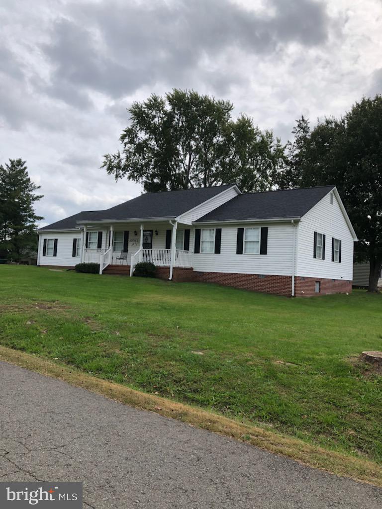 Lovely three bedroom, two bath rambler located in Historic, Remington, Virginia.  Built about 1996, it has served as the home for only one owner.  Well maintained over its life, this home is ready for its next owner.  The home offers one level living for a retiring couple or a young family, just starting out.  The home is complemented with a two car attached garage, which has additional space for storage.  A covered front porch and a wooden rear deck are available for those relaxing morning coffee breaks or afternoon naps in the sun.  In the rear yard, a 14' X 11' storage shed awaits the storage of your year round tools.  Windows are insulated and the exterior siding is vinyl, which helps reduce maintenance.  A nice kitchen and adjacent family room complement each other with convenient access to the rear deck.  A utility room, which can be entered from the garage or kitchen, contains the hot water heater, water softener, clothes washer, dryer and provides a counter for sorting and folding clothes.