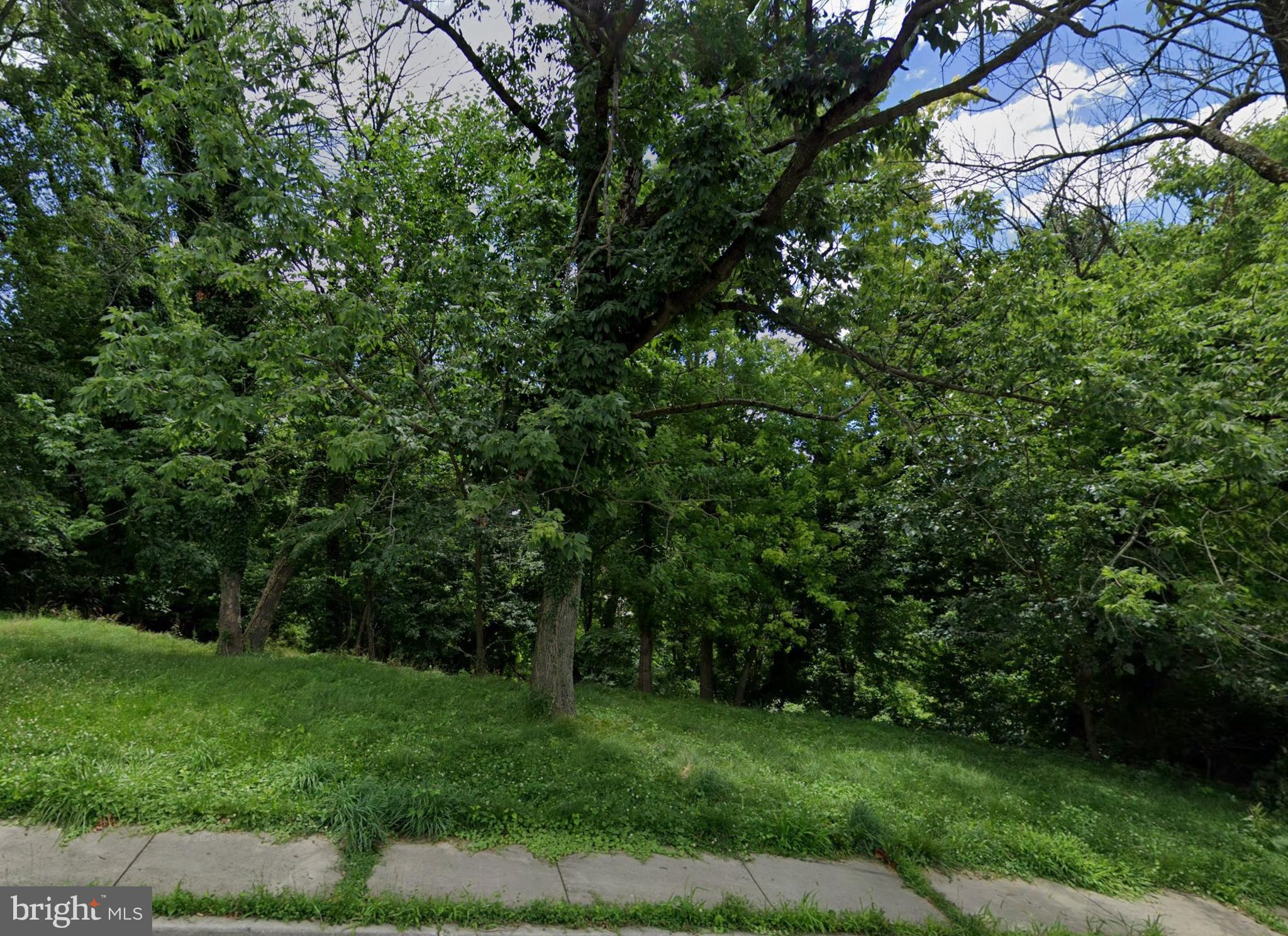 List price is Opening Bid at The Online Only Auction Sale to Be Held on The Auctioneers Website – Bidding begins Thursday, June 25 and ends Tuesday, June 30, 2026 at 1:00 PM. The property consists of an unimproved 6,375± SF lot zoned R-5 in the desirable Woodberry neighborhood of Baltimore City. Located in historic Woodberry, the property is surrounded by a unique mix of historic mill conversions, modern townhomes, lofts, restaurants, and outdoor recreation. Conveniently situated near Clipper Mill, Television Hill, the Light Rail, I-83, Druid Hill Park, and the Jones Falls Trail, the neighborhood offers excellent accessibility and strong residential appeal in North Baltimore.