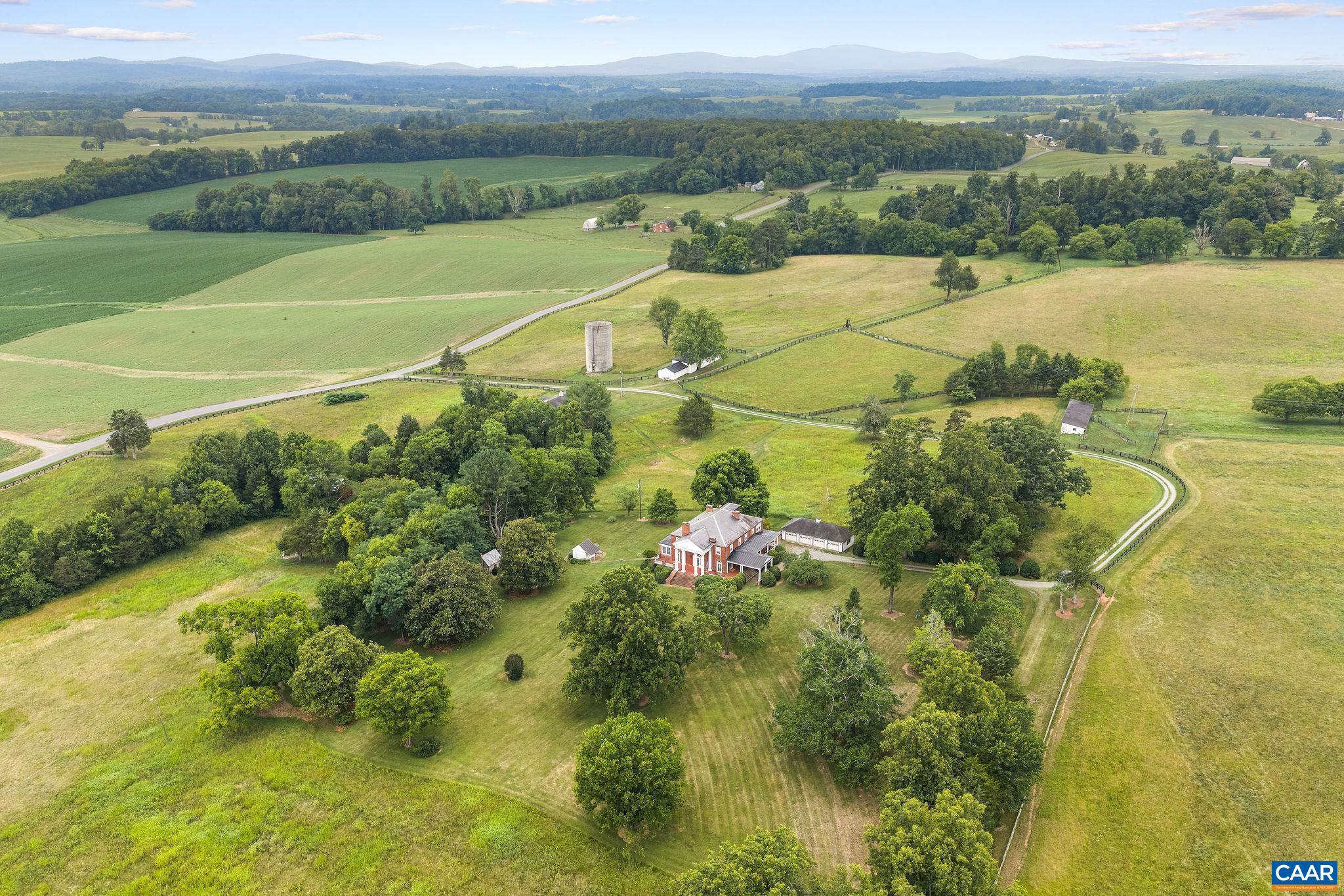 Hilton Farm is a substantial 154-acre farm in Orange, Virginia, offering an exceptional combination of productive land, and historic significance. The farm includes an 11-stall stable, numerous agricultural outbuildings, and one of the last remaining schoolhouses of its era. Together, these buildings provide unusual depth, versatility, and character, supporting a range of equestrian, livestock, and agricultural uses. At the heart of the property stands a gracious five-bedroom, four-and-a-half-bath residence with generous proportions and a thoughtful balance of formal and comfortable living spaces. A relaxing library offers a quiet place to read or gather, the large dining room is well suited to entertaining, and the surrounding rooms retain the warmth, architectural presence, and enduring character that make the home so memorable. With impressive acreage, established farm infrastructure, a distinguished residence, and an exceptional collection of historic and agricultural buildings, Hilton Farm is a rare offering just five minutes from the town of Orange and five minutes from Route 29.,Granite Counter,Wood Cabinets,Fireplace in Dining Room,Fireplace in Living Room,Fireplace in Study/Library