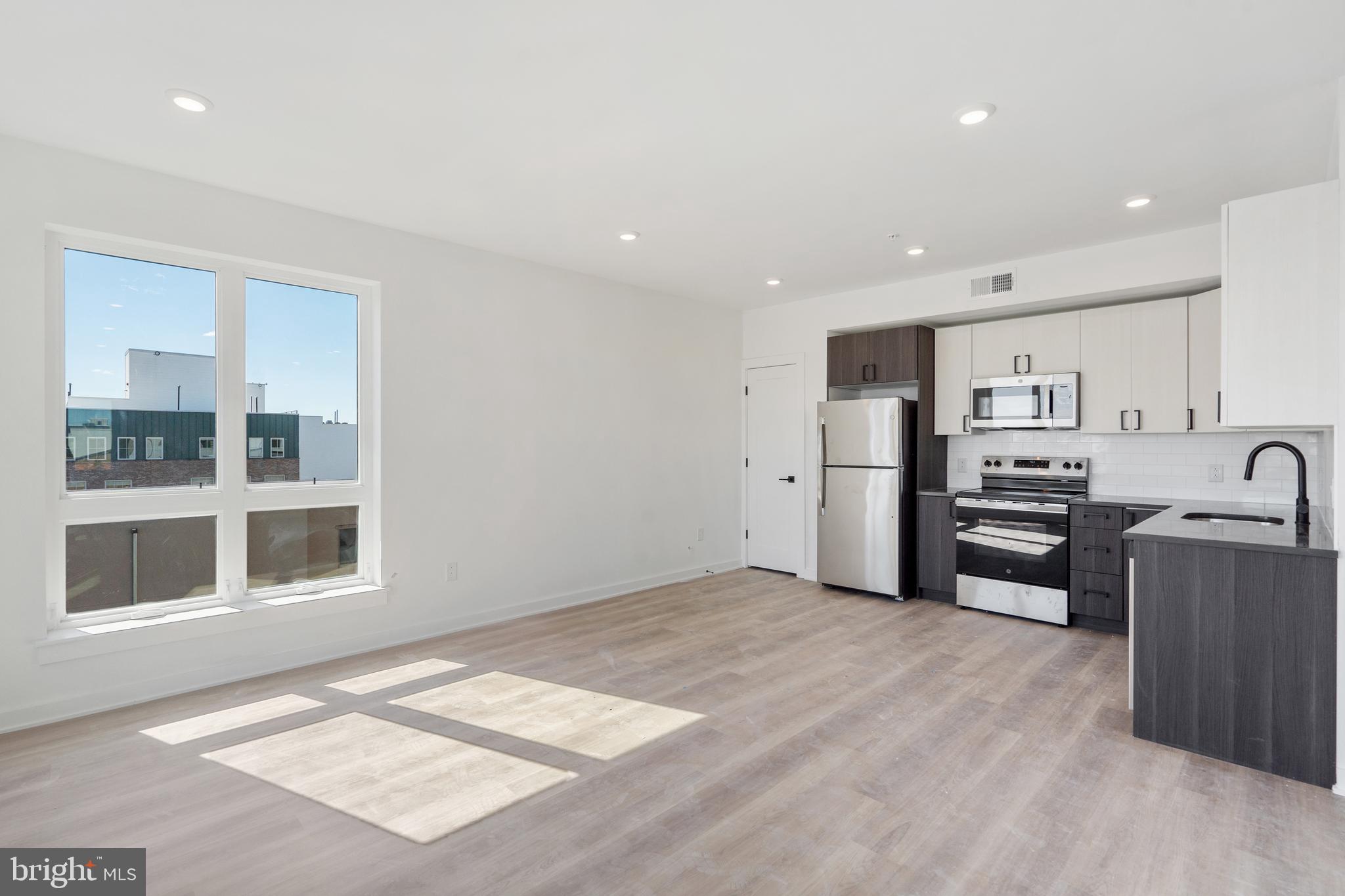 *Now offering up to 3 months free on a 12 month lease and a reduced security deposit of only $500!* 
Price reflects 3 months free on a 12 month lease. Base rent is $2475/month.

Introducing Front Street Lofts, sophisticated Fishtown living now available to lease!! This brand-new development offers a collection of thoughtfully designed 1- and 2-bedroom apartments, each crafted to blend contemporary style with comfort.

Experience open-concept living spaces enhanced by modern finishes and high-end amenities. Our pet-friendly units boast in-unit washer/dryers, kitchens adorned with quartz countertops and stainless steel appliances, oversized sound-dampening windows, and elegant luxury vinyl plank flooring throughout.

Residents can also take advantage of on-site amenities, including a bike storage room, secure package room, and a stunning rooftop deck with sweeping city views.

Be among the first to call these sophisticated apartments home—where urban chic meets affordability. Schedule your tour today and discover elevated living in the heart of Philadelphia!