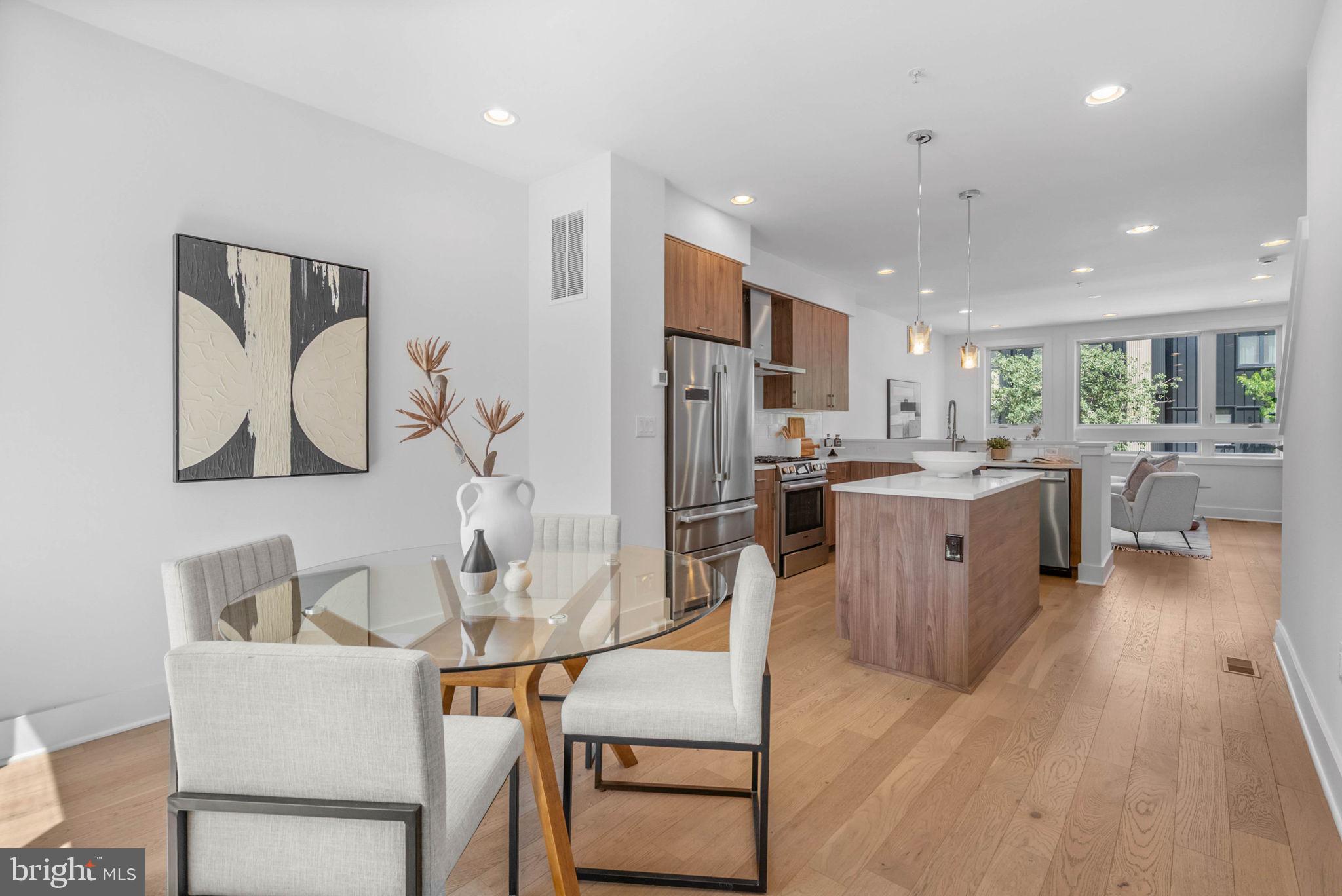 Welcome to The Quarters at Fairmount—a premier community in the heart of Northern Liberties. This 3 bed, 3.5 bathroom home comes equipped with a one car private garage, tax abatement (ends 3/31/2028) and expansive roof deck. The main level showcases a beautiful kitchen complete with stainless steel appliances, custom cabinetry, and an open layout that flows seamlessly into the spacious dining and living areas ideal for entertaining or relaxing. Upstairs, you’ll find three generously sized bedrooms with ample closet space and large windows that flood each room with natural light. The top level leads to a private roof deck with sweeping skyline views. Residents also enjoy beautifully landscaped community gardens and shared outdoor spaces, all while being just minutes from public transportation, shopping, and some of the city’s best dining destinations. Taxes and square footage are the responsibility of the buyer to have verified independently.