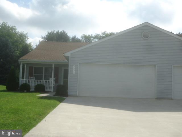 Great one story condo in a convenient over 50 community in Spring Grove!  Enjoy the view of the evergreens from the patio. New carpet in living room, dining room, family room and hallway.  All appliances included.