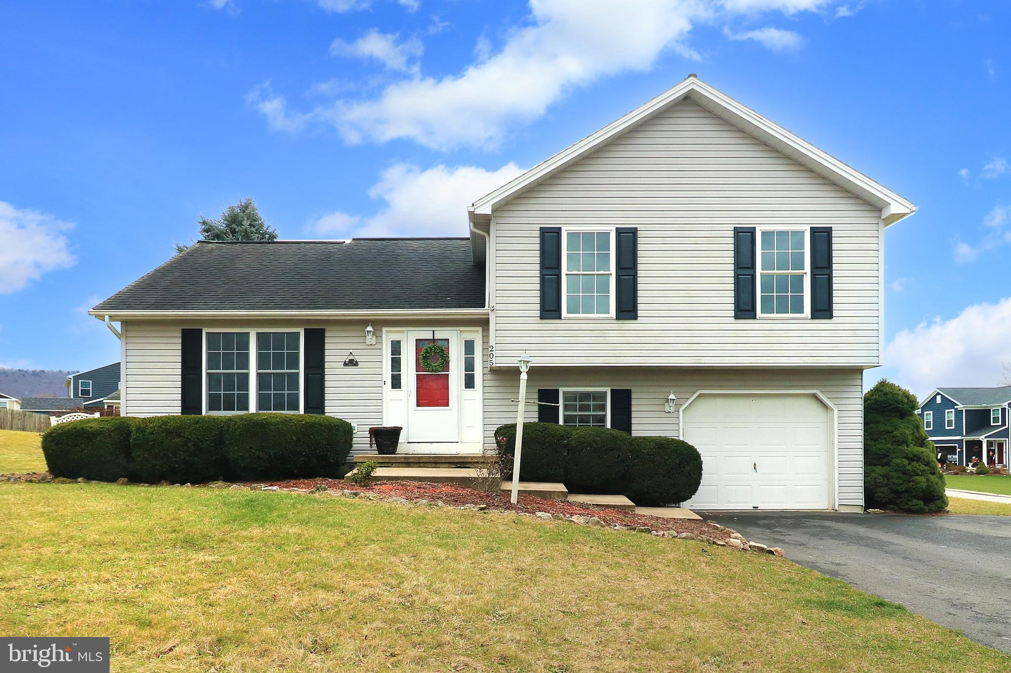 Looking for a sweet spot to call your own? Check out 205 Steeplechase Drive in the desirable Steeplechase neighborhood right on the edge of sweet Pleasant Gap. You'll enjoy the open feel of this 4 level split level home with a surprising amount of space, vaulted living area, mini split A/C, three bedrooms, 2 full baths, and a finished lower level family room providing all the space you need for your loved ones! Whip up everything from weeknight dinners to holiday meals in the lovely open concept kitchen with large island perfect for baking projects, stainless steel appliances, and ample cabinet space. Share meals with your favorite folks in the dining room with sliding door to the back patio, perfect for summertime BBQs and entertaining. Cozy up in the light and bright living room with your favorite book or host a raucous game night in the finished lower level family room with storage. At the end of a long day, steal away to the primary suite with walk-in closet and private bath! Two additional, nicely sized, bedrooms and a shared hall bath complete the upper level. Enjoy the convenience of  the large mid level laundry room with countertops and cabinetry to make folding tasks easy peasy! You'll love having a fenced backyard for playtime and a shed for all of your gardening tools and a one car garage! With a quick commute to PSU campus and nearby elementary school, this home is comfortable and convenient. Welcome home!