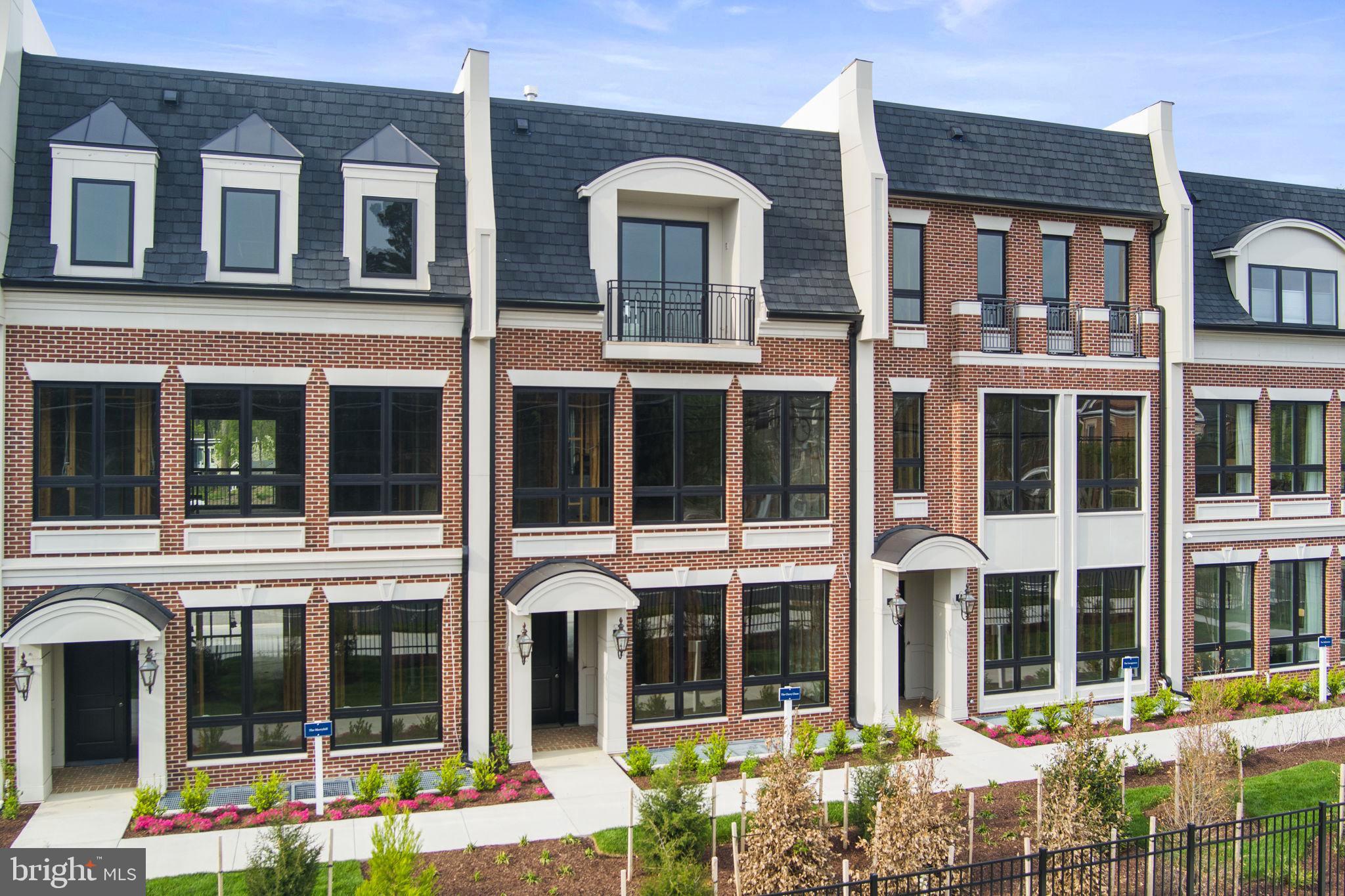 Open this Sunday from 1-4PM. Introducing Chain Bridge Estates — an exclusive new luxury home community in the heart of downtown McLean, Virginia, thoughtfully designed for discerning residents aged 60 and older. This elegant enclave offers the very best in independent living, where sophistication, comfort, and connection come together. This weekend we are announcing our Grand Opening Sales Event! Please visit our community sales center, Wednesday- Sunday, 1-4PM and plan your tour of our furnished model and clubhouse. Our quick delivery homes are almost complete!! This stunning Georgetown model features dramatic floor to ceiling windows and is filled with natural light. Each exquisitely appointed home features 3 to 4 bedrooms, private garages, optional in-home elevators (elevator ready), designer lighting and fixtures, chef-grade kitchens, home offices or sunrooms, guest suites, and spacious covered balconies. Refrigerated concierge closets allow for secure and seamless package and grocery deliveries. At Chain Bridge Estates, exceptional service is a standard. Our dedicated concierge team is professionally trained to provide personalized support hospitality, ensuring every resident feels pampered and cared for. The Clubhouse is nothing short of spectacular — furnished by Restoration Hardware and featuring a state-of-the-art fitness center, a spa with Hydroworx Therapy Pool, saunas, medical offices, and a serene private patio with teak furnishings, a wood-burning fireplace, and a fully equipped outdoor kitchen with gas grills perfect for entertaining. This beautifully landscaped community offers walking trails, curated gardens, and open green spaces for both relaxation and activity. Wellness is central to the experience, with optional 24/7 in-home healthcare provided by Bayada, on-site concierge medical services, and a wellness suite that can accommodate your personal physician for in-person or virtual appointments. Visit our open houses or contact our dedicated team to plan your new amazing residence.  Photos are of a similar finished model and developer reserves the right to change pricing and features. Property taxes are estimated and set by the county upon completion. Floor plans vary per model and measurements are estimated.  Agents must accompany clients and register on their first visit. Thank you!