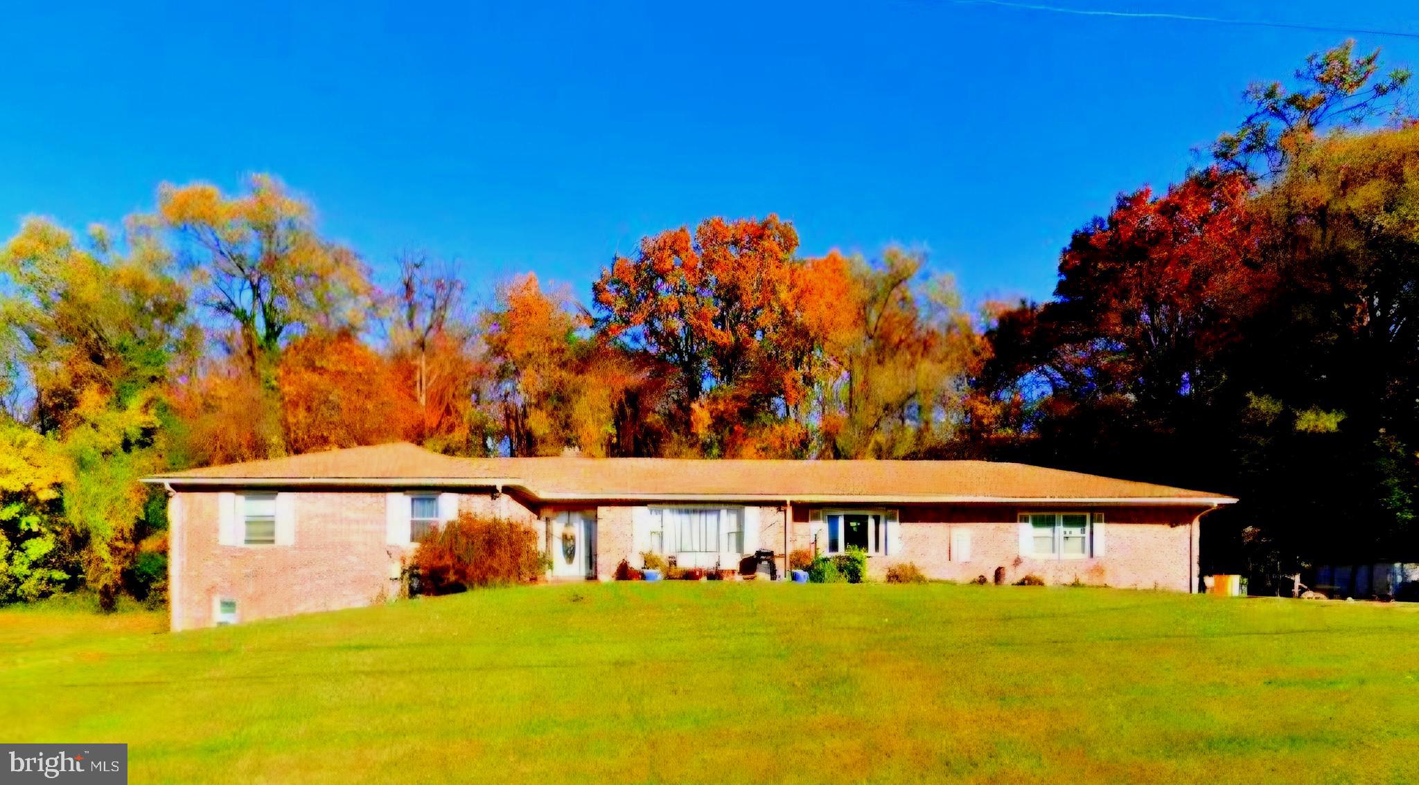 Awesome Ranch-style diamond home in the neighborhood ** 1.53 acre lot  **2374 finished sq ft Upstairs and 1218 finished sq ft downstairs**1100 sq ft unfinished in the lower level **Center Hall floor plan with formal living room, formal dining room, separate family room with stone woodburning fireplace, spacious kitchen **4 bedrooms upstairs with 2 full baths and 2 half baths**Owner's bedroom has walkin closet and full bath** ** Family room with slider to a Screened porch**Hardwood floors main level ** Lower level is finished with 2 bedroom, 1 full bath, family room, kitchen**  Public water and public sewer ** Natural gas heat ** Gas cooking on main level ** 3 ceiling fans in family room, kitchen, dining room ** 2 car garage ** Woodstove "as is" (pipe "as is")**Basement has been professionally waterproofed with life warranty