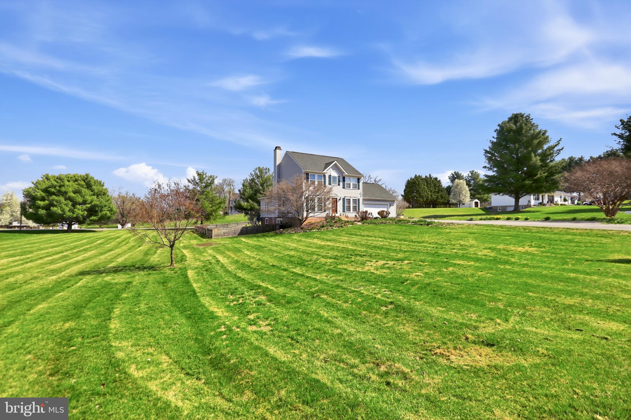Step into your personal retreat at 145 Maplewood Ct in picturesque Harpers Ferry, WV where historic charm meets modern living in one of the East Coast’s most coveted commuter enclaves.
This stunning 4 bedroom, approximately 3,300 sq ft colonial, thoughtfully expanded and meticulously renovated by the owners with over $245K invested since 2005 (Driveway widened from single to double, with expanded side parking area; new 50 year architectural shingle roof, 2- story addition adding over 600 sq.ft of living space to the home; new concrete patio, full kitchen redesign, new HVAC system, porcelain flooring, master bathroom renovation, new carpet through the home, new washer and dryer), delivers turn key living at its finest. The show stopping 2023-2025 kitchen renovation features quartz countertops, a massive island, premium appliances, a walk in pantry, and a new laundry/mudroom, perfect for the home chef or busy family. Fresh 2022 windows and hypoallergenic carpet upstairs, a state of the art Culligan whole house water treatment system, security system, luxurious primary bath vanity, plus fresh interior/exterior paint and professional landscaping complete the picture. Earlier investments include a 16’ x 16’ sunroom addition plus fourth bedroom, upgraded HVAC, 50 year architectural shingle roof, porcelain tile floors throughout the main and basement levels, multiple patios, a walkout basement, and a private backyard oasis with pond, waterfall feature, and vibrant gardens.
Enjoy effortless entertaining in the sun drenched family room, peaceful mornings on the patio overlooking your 1.27 acre lot, or weekend adventures steps from world famous Harpers Ferry National Historical Park, the Appalachian Trail, and the confluence of the Potomac and Shenandoah rivers.
Location is the ultimate game changer: top rated Jefferson County Schools (Driswood Elementary, Harpers Ferry Middle, Jefferson High) are just minutes away, while the commute is a breeze, roughly 40 minutes to Dulles Airport, under 1 hour 15 minutes to Washington, DC, 25 minutes to Frederick, MD, and quick drives to Leesburg or Winchester. Low West Virginia property taxes paired with small town serenity and big city access make this the smartest lifestyle upgrade you’ll find.
Pride of ownership radiates from every detail in this one of a kind home. Whether you’re seeking a sophisticated family haven or a serene escape with effortless connectivity, 145 Maplewood Court sets the new standard.
Opportunities like this don’t last long in this sought after market. Schedule your private showing today and discover why this property is poised to deliver maximum value.

The lower level includes a recreation room and a fourth bedroom, providing additional living flexibility. Outdoor living is enhanced by a 14' x 14' deck and a fully fenced backyard accented by flowering gardens and a tranquil pond, an ideal setting for relaxation or entertaining.

Conveniently located near Route 340 and two MARC train stations, the home offers excellent commuter access. All measurements are approximate.