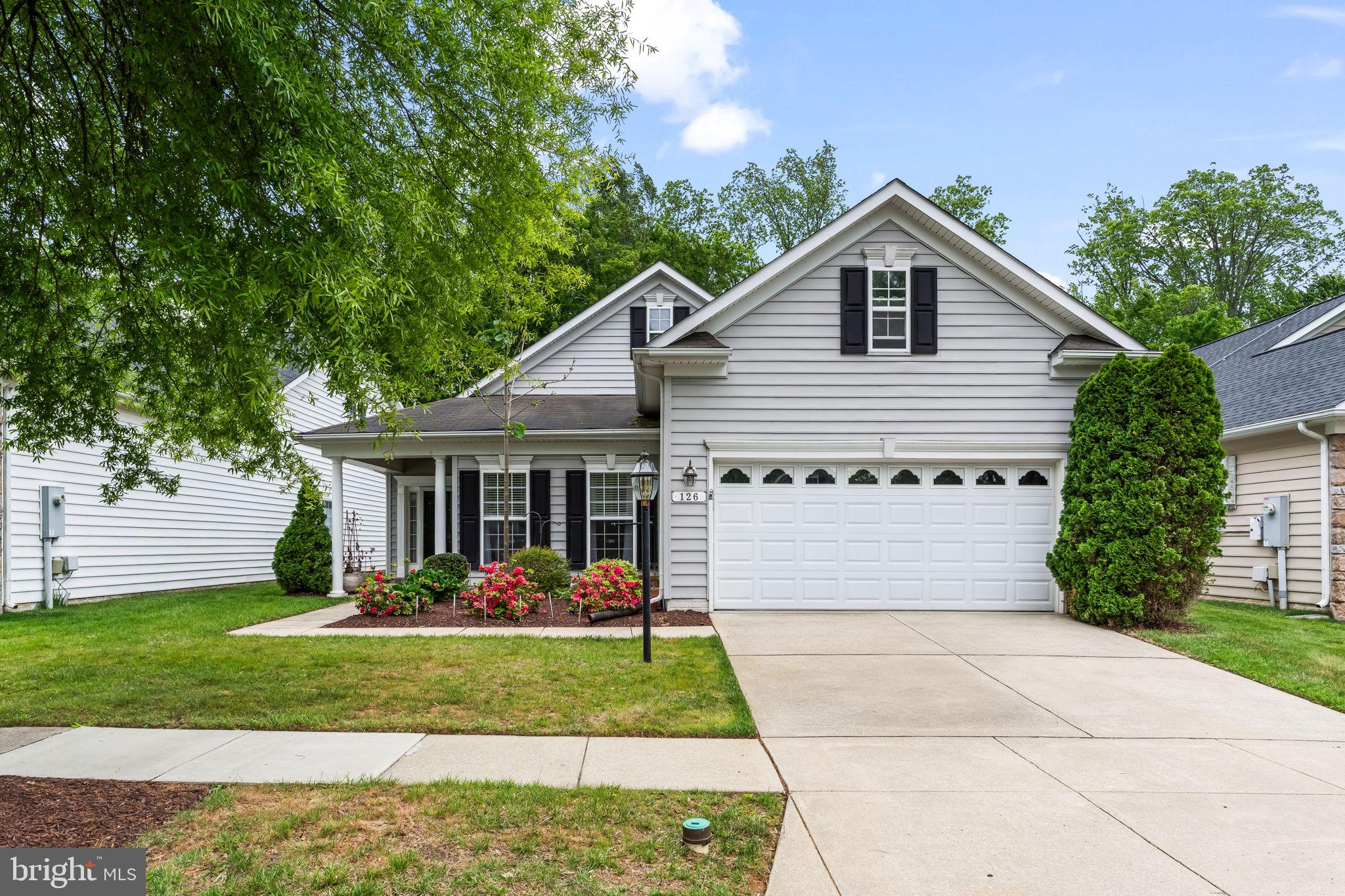 Symphony Village a premier 55 plus active adult community which is well desired and nicely located just on the edge of Centreville. If you are looking for the perfect 55 plus community this is it! Active adults loving life and enjoying the community this neighborhood provides from Happy Hours, Pools, events, pickleball, the gym and more. You will always see neighbors walking, riding bikes and enjoying life in the Village! This home is one of the few which gives you privacy out back backing to the woods offering you complete peace. Relax on your back patio and watch the wildlife, listen to the birds, drink your coffee, grill or have nice gatherings with your friends. This amazing and well kept home is ready for a new owner and you will not be disappointed! Offering 3 nice sized bedrooms an d2 full bathrooms with a nice open concept this floor plan allows you the option to set it up how you choose. Offering a ton of natural lighting with all of the windows this home exudes fresh and airy feelings. The kitchen has a ton of cabinets perfect for the person who loves to cook and plenty of space for your kitchen table. You will enjoy the gas fireplace all winter long as it is a great feature. The garage offers 2 parking spaces and a huge room above the garage with ample storage. This neighborhood's HOA includes lawn care, trash, snow removal, and the FANTASTIC Club house! Come and take a look and see why everyone loves Symphony Village! You will want to live here too!