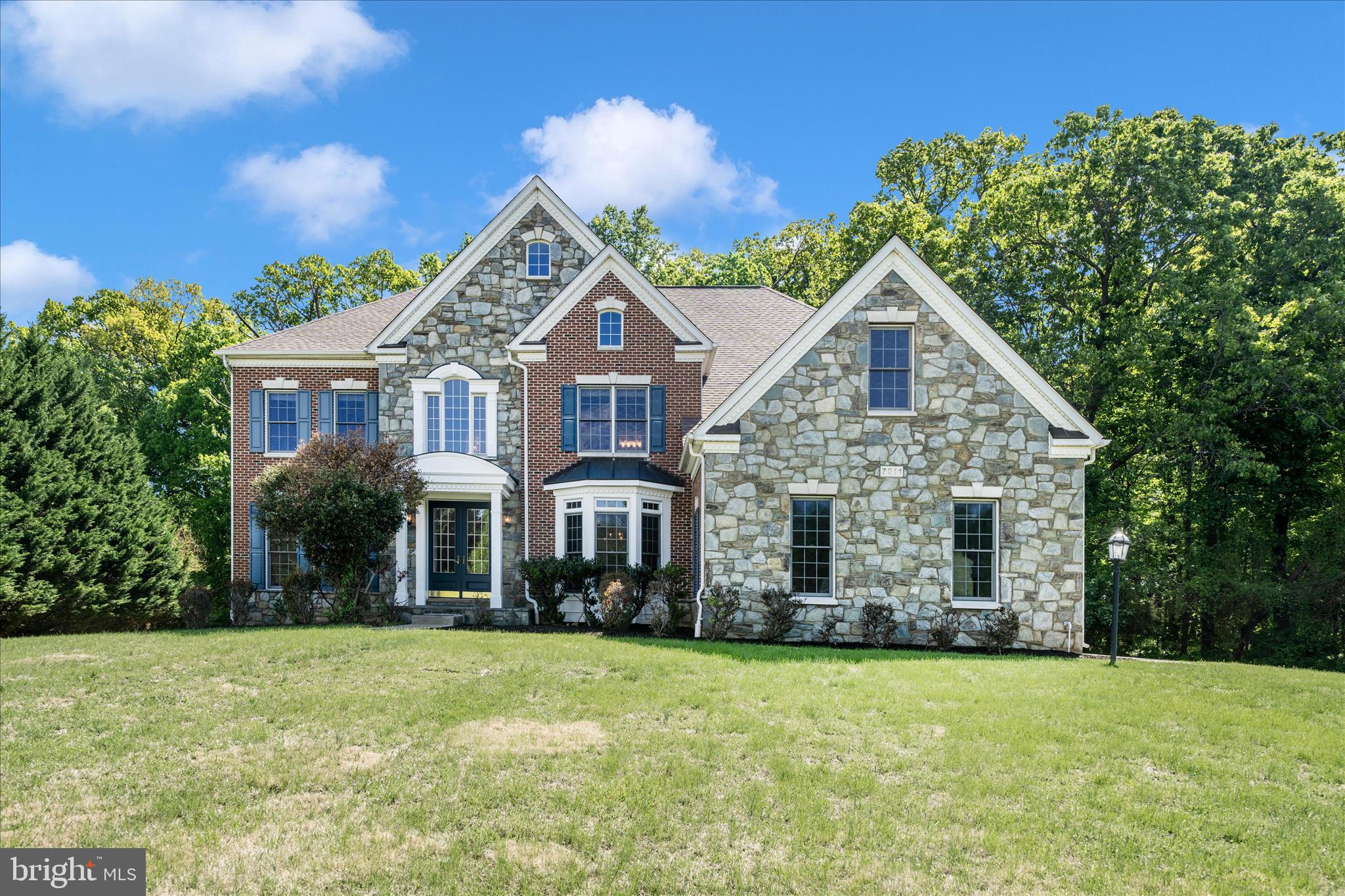 Exquisite Colonial Estate in Prestigious Brookefield – Elegantly Updated for Modern Living

Nestled within the highly sought-after Brookefield community, this distinguished Colonial residence presents an exceptional blend of timeless architecture, refined upgrades, and expansive living. Offering over 6500 square feet on a private 2-acre homesite, this meticulously maintained estate delivers sophisticated comfort and impressive functionality throughout.

Main Level | Refined Living & Thoughtful Design
A gracious entry welcomes you into a beautifully flowing floor plan enhanced by newly installed hardwood flooring and a fresh, neutral palette that fills the home with warmth and natural light.

The gourmet kitchen is designed for both everyday living and elegant entertaining, featuring energy-efficient stainless steel appliances, including double wall ovens, a sleek range hood, spacious refrigerator, and newly installed granite countertops.
Adjacent to the main living space, a sun-filled sunroom offers a peaceful retreat with seamless access to outdoor living. A private main-level executive office provides the ideal work-from-home setting, while the inviting family room with fireplace creates a warm and sophisticated gathering space.

Upper Level | Luxurious Private Retreats
The upper level is anchored by an extraordinary owner’s suite featuring a grand bedroom with abundant natural light, an oversized walk-in closet, and a spa-inspired en-suite bath complete with a large soaking tub, separate shower, dual vanities, dedicated makeup station, and extensive storage.
The secondary bedroom suite features its own private full bath, while two additional generously sized bedrooms are connected by a well-appointed Jack-and-Jill bathroom, offering both privacy and convenience.

Lower Level | Exceptional Entertaining & Guest Accommodations
The fully finished walk- lower level is an entertainer’s dream, showcasing an elegant wet bar and expansive recreation space.
This versatile level also includes an additional private bedroom with its own full bathroom, ideal for guests or extended family. Three flexible bonus rooms offer endless possibilities for a home theater, fitness studio, hobby rooms, or additional office space. Large windows and walk-out access provide exceptional natural light.

Notable Features & Upgrades
• Recently replaced roof 
• Brand-new washer and dryer 
• New carpeting throughout bedrooms 
• Fresh interior paint throughout 
• 5 spacious bedrooms, 5 full bathrooms, and 2 half baths 
• Side-entry attached 3-car garage with ample storage 

Private Setting | Prime Convenience
Situated on a picturesque 2-acre lot, this remarkable property offers a peaceful, estate-like setting while remaining conveniently located near major commuter routes, shopping, dining, and everyday conveniences.