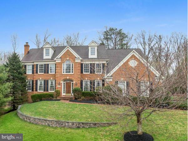 PRICE REDUCED!! Elegant Sandy Spring Builders col w 2 story foyer, 9' ceilings main lvl, open floorplan & tons of natural light! Private setting w 2 ACR BACKS TO PARKLAND, gourmet kit w morning rm open to family rm with stone fpl, large mstr ste w 2 walk-in clsts and spa-like bath, fab walk-out LL w  rec room, guest room, full BA , AC new 3yrs, 3 CAR GAR & YARD w ROOM FOR POOL!