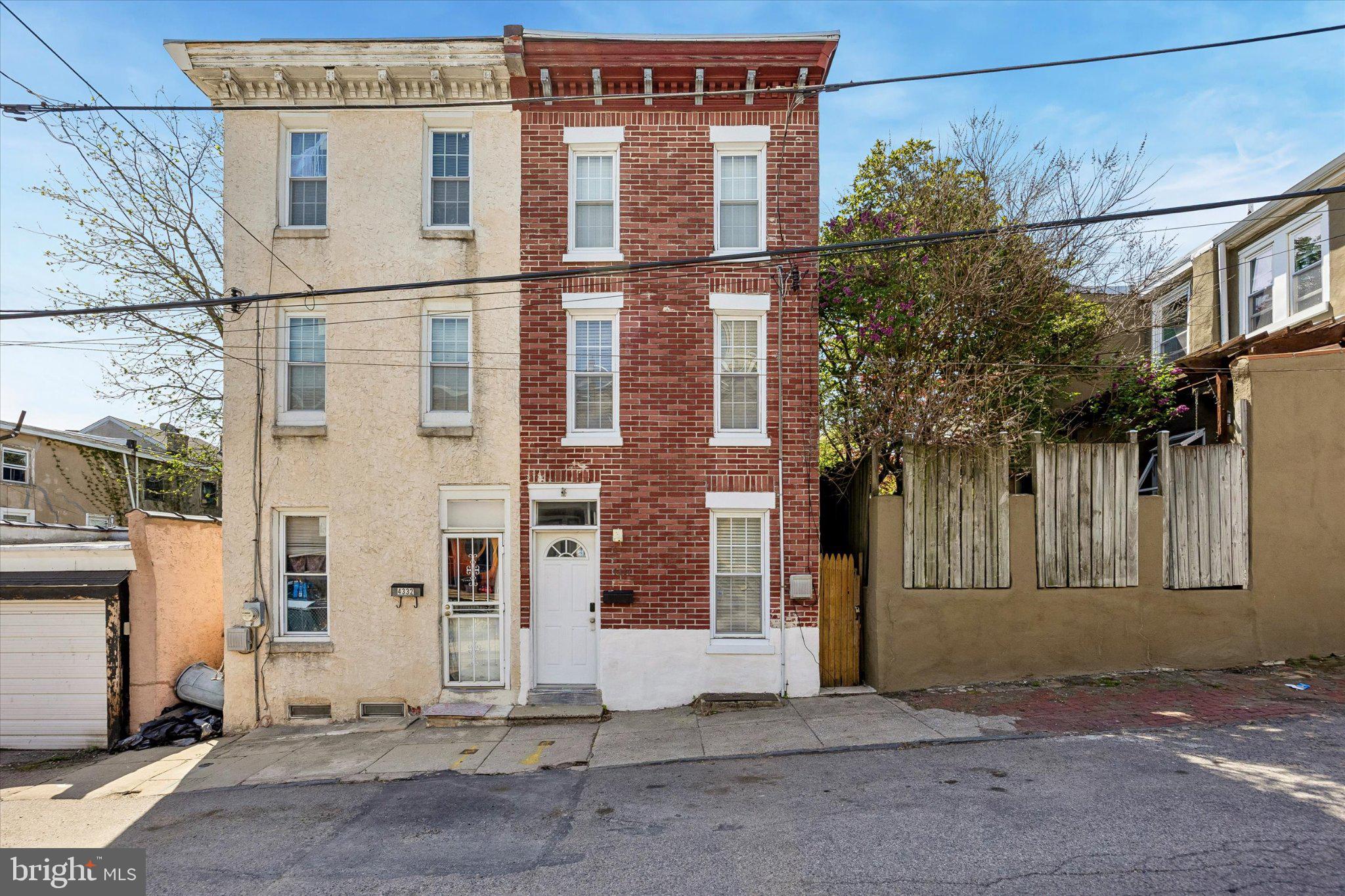 Move in ready Manayunk property. Walk inside to this well maintained 3 bed 2 bath home. Spacious living spaces leads into the full kitchen and full bathroom with washer dryer. Go upstairs to the 2nd floor and find two evenly sized bedrooms. Head up to the upper floor to the third bedroom with a full bathroom on the same level. The home has wooden floored entrance and living space. Carpeted bedrooms,  central air, stucco & brick ext as well as private fenced in rear deck. Close to all forms of transportation and a short walk to Main Street in Manayunk.
