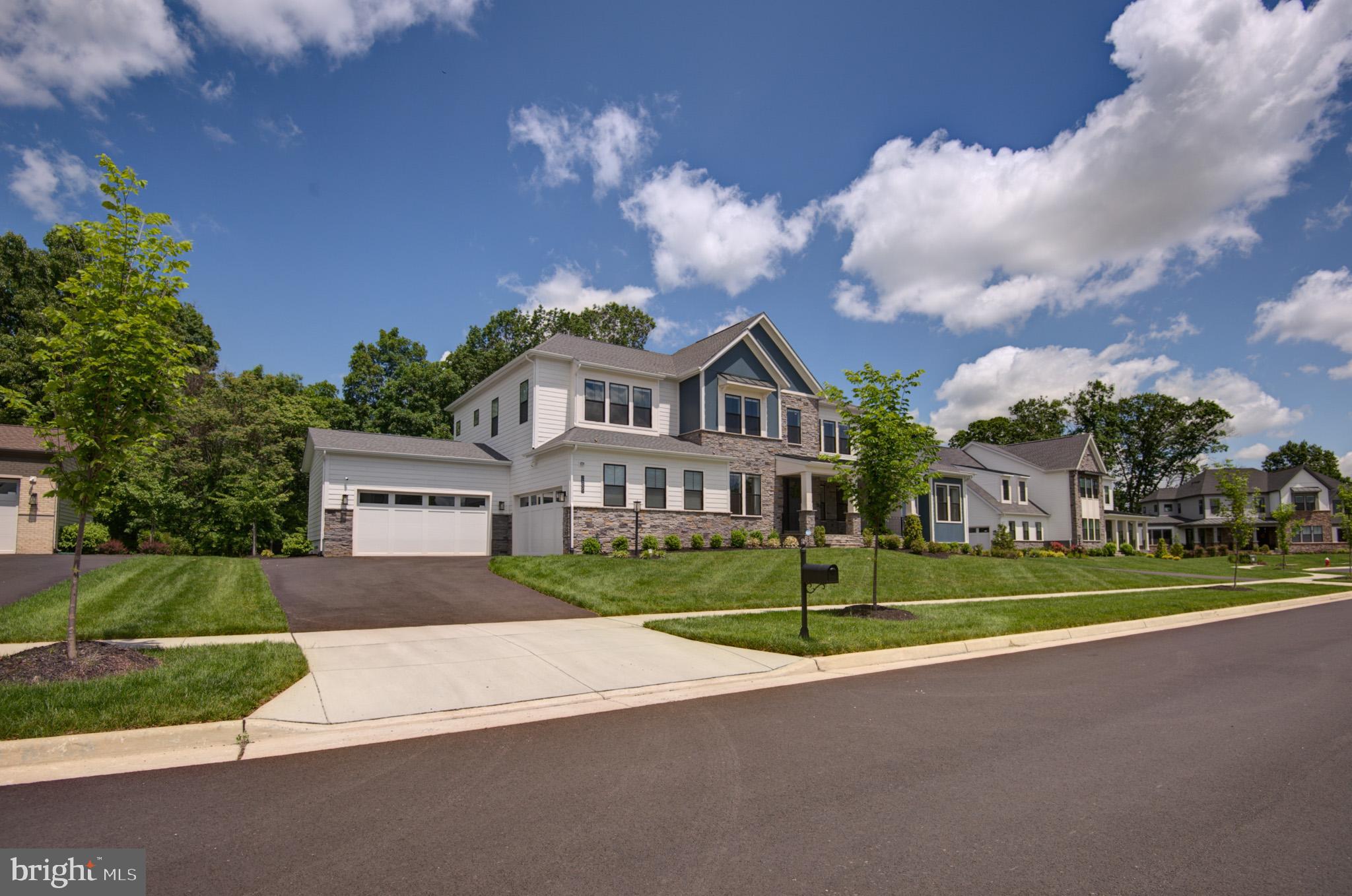 A rare find! A gem that cannot be missed! A minimalistic, pure organic home! Precious home, w/its 3 sides FIBER CEMENT SIDING | Home sits closer to cul-de-sac, slightly elevated from the street | Backs to wooded area | Prestigious year 2022 ESTATE home, TOLL BROTHERS  built, ROSSLYN floor plan is sited on a 0.48 ACRE pad, in a much desired LENAH MILL sub-division | This Breathtaking home has INTERIOR FINISHED of 8,144 sq ft, @ its 3 levels, equipped w/spacious 6 bed rms, 6 full baths, & 1 half bath. Wow!! 5 bed rms w/its en-suite bath; 5 standing showers | Humongous covered front porch; a separate private access to multi-gen suite @ front porch | 266 sq ft of luxury covered rear porch & 553 sq ft of poured patio | Chef's ultra gourmet kitchen w/stacked cabinets & WOLF_SUB-ZERO_ASKO appliance package | Prep kitchen w/KITCHENAID appliance package | Main level grand multi-generation suite | 10' ceilings @ main level & 9' ceilings @ upper & lower level | Box window & numerous picture windows | Highest level engineered hard wood floors | Primo 60" fireplace @ great room | 12' multi-panel stacking doors | Oak stairs w/painted risers @ all flights | Interior & Exterior French doors | Under cabinet LED lighting | Apron white sink | Huge pantry | Rear foyer/mud rm | Laundy cabinet sink | Tray ceiling @ primary | Custom closet shelving @ walk-in-closets | Wet bar rough-in @ rec area | 3 zone HVAC | Tankless gas water heater | 3 hose bibs; rear, side, & garage | 4 CAR GARAGE; 475 sq ft side-load 2 car garage & 460 sq ft front-load 2 car garage. Garage door openers & keyless entry, Wi-Fi enabled myQ app | Electric car charging outlet 220 volt | Long driveway that comfortably fits 6 cars | Solar Exemption: on your real estate taxes | 

IMPROVEMENTS_PURCHASES Since ACQUISTION To DATE, a total value of app. $163K: Solar Panel System (Full Ownership NOT leased) *  Finished Home Theater Rm * Media Equipment: Screen, Speakers, & Projector * Finished Storage Rm behind the Home Theatre * Window Blinds: Lutron Motorized @ main level  (Warranty for 3 more years) + Manual Top-Bottom @ upper & lower level * Main Kitchen + Prep Kitchen: 2.5" Quartz Counters & running Quartz Backsplash * Underground Sprinkler System * Installed Rear Porch Screens (2) * Whole House Water Filtration w/UV Filter * Video Surveillance * Exterior Lighting * 10 Ceiling Fans from Rejuvenation & Neiman Marcus * Light Fixtures from Arhaus & Crate & Barrel * Custom Black Wall w/Moldings @ Dining Rm * White Draperies from West Elm * Pedestal Wi-Fi enabled 5.2 cu.ft. Washer & 9 cu.ft. Dryer (Warranty in place) | 

Excellent school pyramid | Neighborhood features: Amphitheater, Cedar Lake, Bark Park, Boat House Lake, Club House,  Community Garden Plots, Swimming Pool, Gym, Tennis courts, Tot Lots, Basket Ball, Volley Ball, Soccer, Lacrosse, & Soft Ball | Routes: Major commuter routes; Braddock Rd, NorthStar Blvd, Gum Spring, Rte 50, Loudoun County Parkway & 267 Greenway/Toll | Proximity: Hal and Berni Hanson Regional Park, Stone Springs Hospital Center, Loudoun County Gum Spring Library, Dulles International Airport, Loudoun Station, Brambleton Town Center, Broadlands Village, One Loudoun, Dulles Landing, state of the art library @ Brambleton Town Center, upcoming Avonlea & Arcola Center, Public transportation, & Metro Rail |  Location: Restaurants, boutique retailers, movies, meeting places, parks, recreational areas & intricate trail network | Excellence in location & convenience | Seller prefers 30-60 closing |