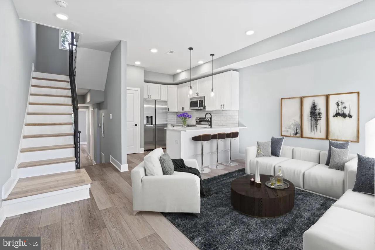 Introducing 2112 Eighth Street! Located in one of in one of the strongest and booming Multifamily Market in 19122! The building has 2 units, perfectly designed with a functional open floor plan. Unit 1 is a 3BD | 2.5 BA Bi-level apartment with large rear yard. Unit 2 is a 2BD | 2 BA Bi-level apartment. Both Units feature a flexible floor plan, High ceilings, large windows and an open contemporary feel. Wide plank floors & recessed lighting. Both kitchens are home to shaker-style cabinetry, subway tile, granite countertops, stainless steel appliances. There is ample closet space and W/D hook up in both units. In a great location for commuters, Close proximity to Temple University and the Septa Regional Rail to Center City.

Both Units are currently rented!