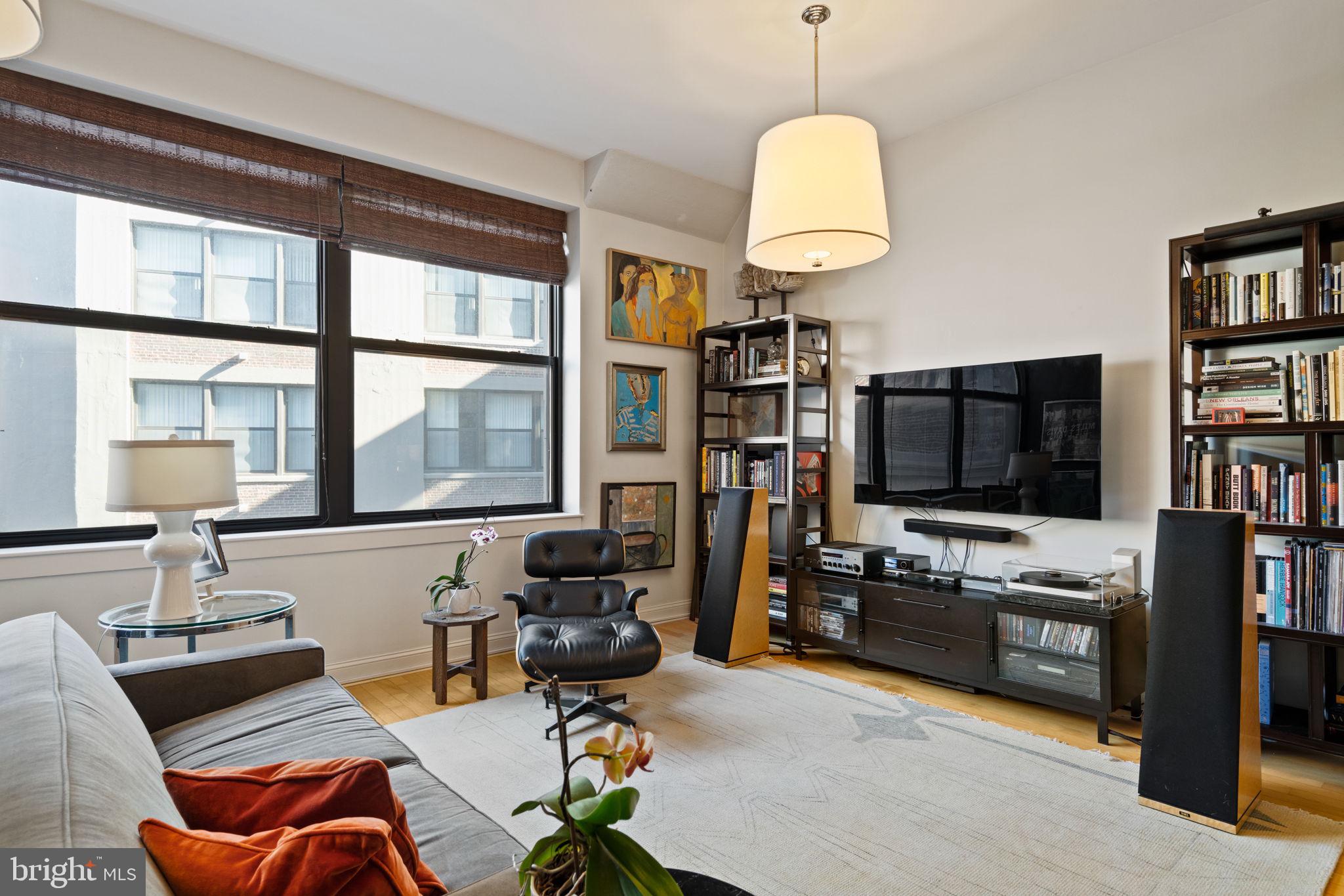 Exquisite Loft Living at Marine Club – Over 900 sq. ft. of Style and Comfort

Discover Unit 415C, a warm and eclectic loft that combines generous space with modern sophistication. At over 900 square feet, this rare, larger unit offers a flexible, open layout designed for both living and entertaining:

• Lofted bedroom & spacious office: Perfect for work-from-home or creative pursuits
• Open living and dining areas: Bathed in natural light from oversized north-facing windows with serene courtyard views
• Modern kitchen: Equipped with newer stainless steel appliances, sleek black Corian countertops, abundant cabinetry, and a stylish tile backsplash
• Luxurious marble bathroom: Featuring a separate shower and a jetted soaking tub for ultimate relaxation
• Extra conveniences: Full laundry room, generous closet space, and a deeded garage parking space

Marine Club elevates urban living with amenities designed to enrich every day: a 24/7 front desk, a large fitness center, a central courtyard with a koi pond, seasonal lounge, and a dog-friendly play area. 

Location is everything! Walk to grocery stores, shops, and public transit. Enjoy quick access to Center City and vibrant South Philly neighborhoods like Graduate Hospital, Bella Vista, Passyunk Square, and East Passyunk.

Unit 415C isn’t just a home—it’s a lifestyle. Spacious, move-in ready, and full of charm, this loft is a rare opportunity in one of South Philly’s most desirable addresses.