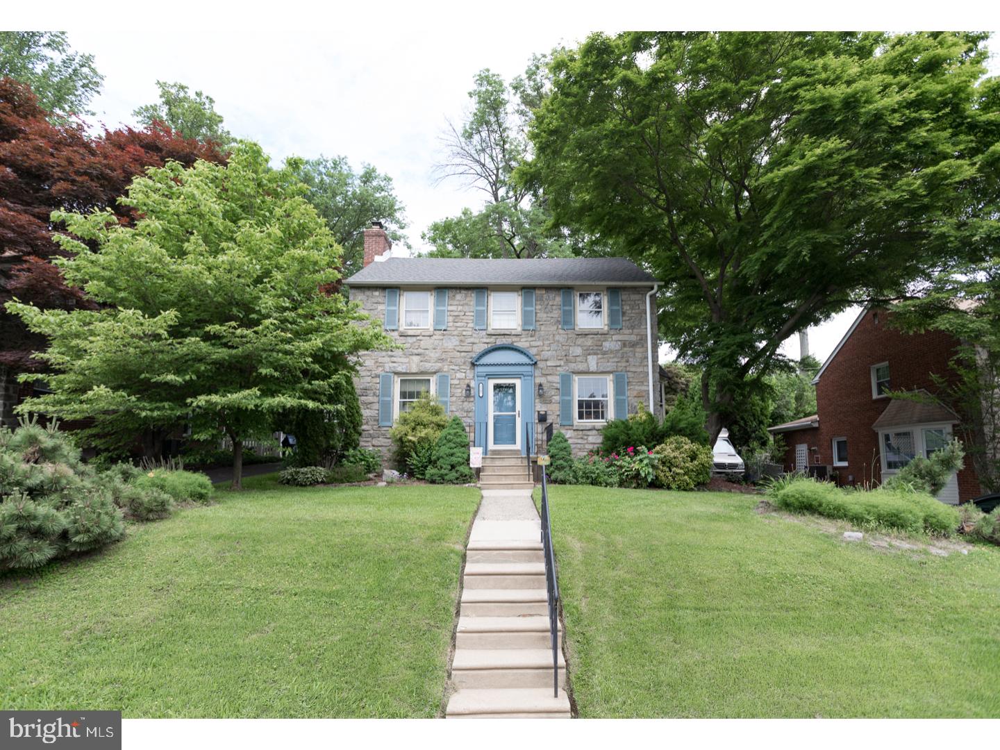 Welcome to 5207 Bella Vista Rd, a charming and vibrant stone front home that features 3 bedrooms and 1.5 baths and is situated in the highly desirable Aronimink section of Drexel Hill. Enter into the spacious and inviting living room equipped with working brick fireplace and decorative mantle, solid hardwood flooring, and effusive natural light from the numerous windows. Opposite the living room is the formal dining room with big bay window and rustic light fixture. The kitchen is off the rear and is highlighted by beautiful quartz countertops with perfectly paired solid wood cabinetry, breakfast bar, and modern appliances including dishwasher and gas stove. Also on the first floor there is a powder room and large den with wall to wall carpeting, wood paneling, ceiling fan, and closet. Kitchen access to the spacious screened-in rear porch that leads to a big beautifully landscaped yard with gazebo & shed. Finished basement with game/TV room, bar setup, and laundry room with washer and dryer included. On the second floor you will find 3 very generously sized bedrooms with ample closet space and ceiling fans, as well as the full hall bath. Gas heating and cooling. Large driveway with space for up to 4 or 5 car parking. New roof installed in 2013. Make your visit today!