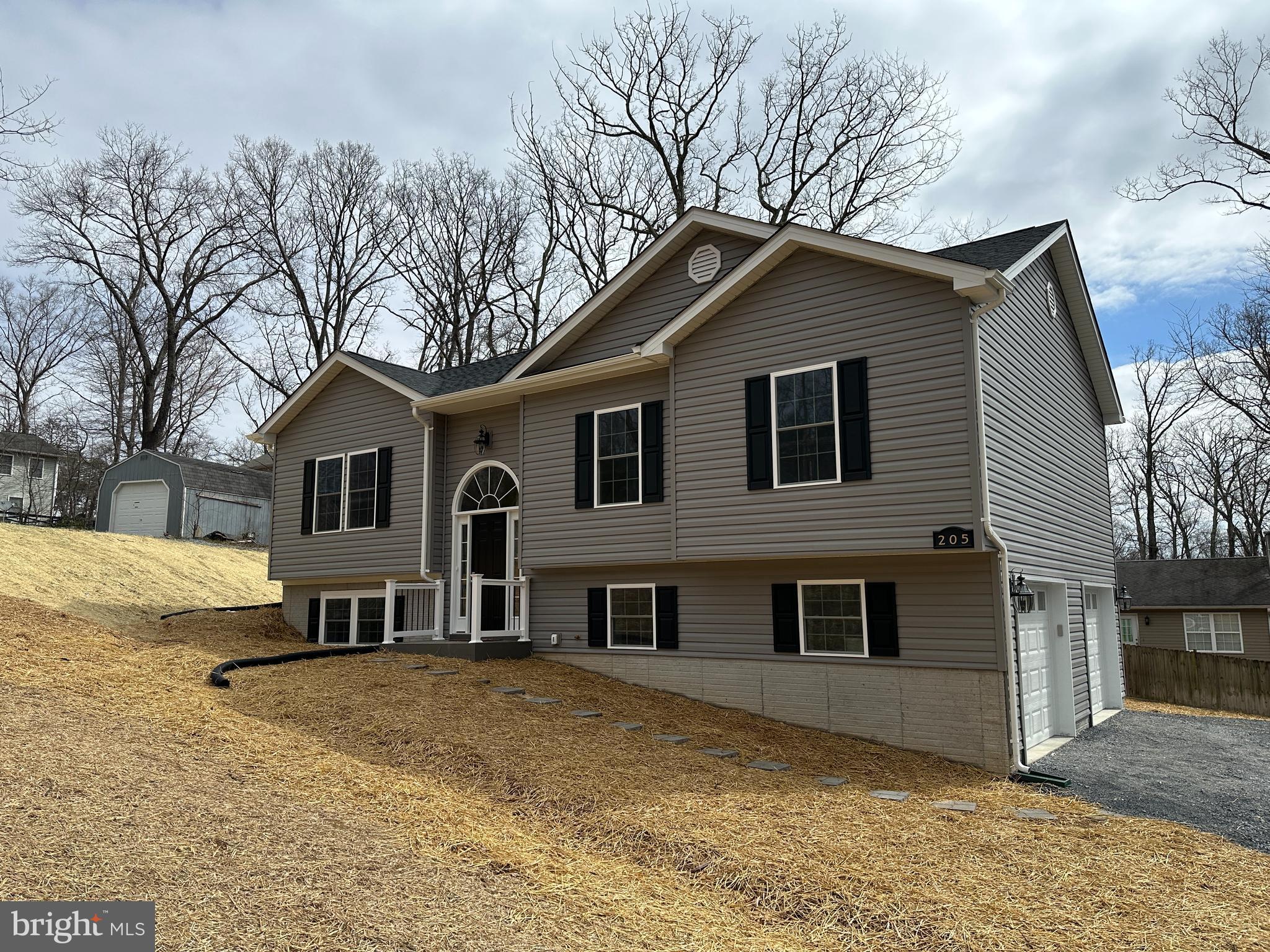 6-2-26 Framing underway.  

Current Shawneeland Inventory
107 Pinto Trail (split foyer)
208 Beaver Trail (split foyer)
210 Beaver Trail (split foyer)
212 Falcon Trail (colonial)
211 Inca Trail (colonial)
103 Tonto Trail (split foyer)
123 Killbuck Trail (colonial)
Stunning 3BR/3BA home on over 1/3 acre lot with available Xfinity internet (not all streets have it). Easy entrance access. Open floor plan features vaulted family room & kitchen. Upgraded kitchen boasts Bonus Granite Island & premium cabinets. Luxury finishes include hardwood throughout the entire main floor, stairs & bedrooms, plus tile in all baths. Huge value: Almost 2,000 sq ft Finished Rec Room on the lower level with upgraded LVP flooring and third full bath—the "biggest bang for your buck" for square footage! 2-car garage included.
