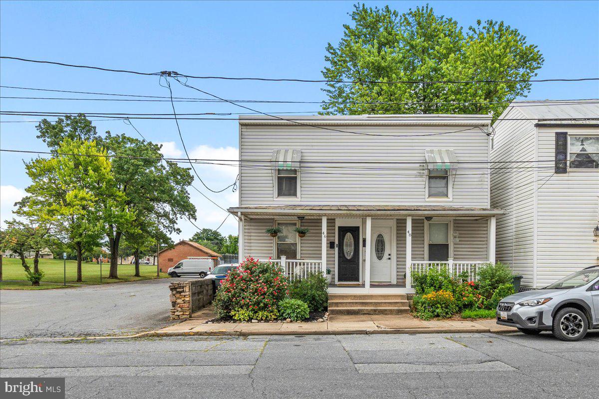 Welcome home to this beautifully renovated gem in the heart of Downtown Frederick! Updated in 2021, this charming 3-bedroom, 1.5-bath home blends timeless character with modern style, creating a space that is as inviting as it is functional. Step onto the low-maintenance composite front porch and into a home filled with warmth and character, featuring original period trim, gleaming hardwood floors, fresh paint, updated lighting, and an open-concept living and dining area that’s perfect for both everyday living and entertaining. The spacious kitchen is designed to impress, offering modern cabinetry, quartz countertops, abundant lighting, a butcher block center island, and plenty of workspace for cooking and gathering. Just beyond, you’ll find a generously sized mudroom with laundry, a convenient half bath, and additional storage. Outdoors, enjoy a private, fenced backyard complete with a large patio and storage shed—ideal for relaxing, gardening, or hosting friends and family. There’s even the potential to add dedicated rear parking or a driveway for added convenience. Upstairs, the home continues to shine with an updated full bathroom, two spacious secondary bedrooms that also make excellent home offices, and a large primary bedroom featuring a walk-in closet. A second-story composite covered deck overlooks the backyard, providing the perfect place to enjoy your morning coffee or unwind in the evening. Located just minutes from the shops, restaurants, breweries, and entertainment of Downtown Frederick, only steps from the Frederick Fairgrounds, and with quick access to major commuter routes, this home truly offers the best of location and lifestyle. Whether you’re searching for your first home, a weekend getaway, or a smart investment opportunity, this property checks all the boxes. Schedule your private tour today and discover everything this exceptional home has to offer!