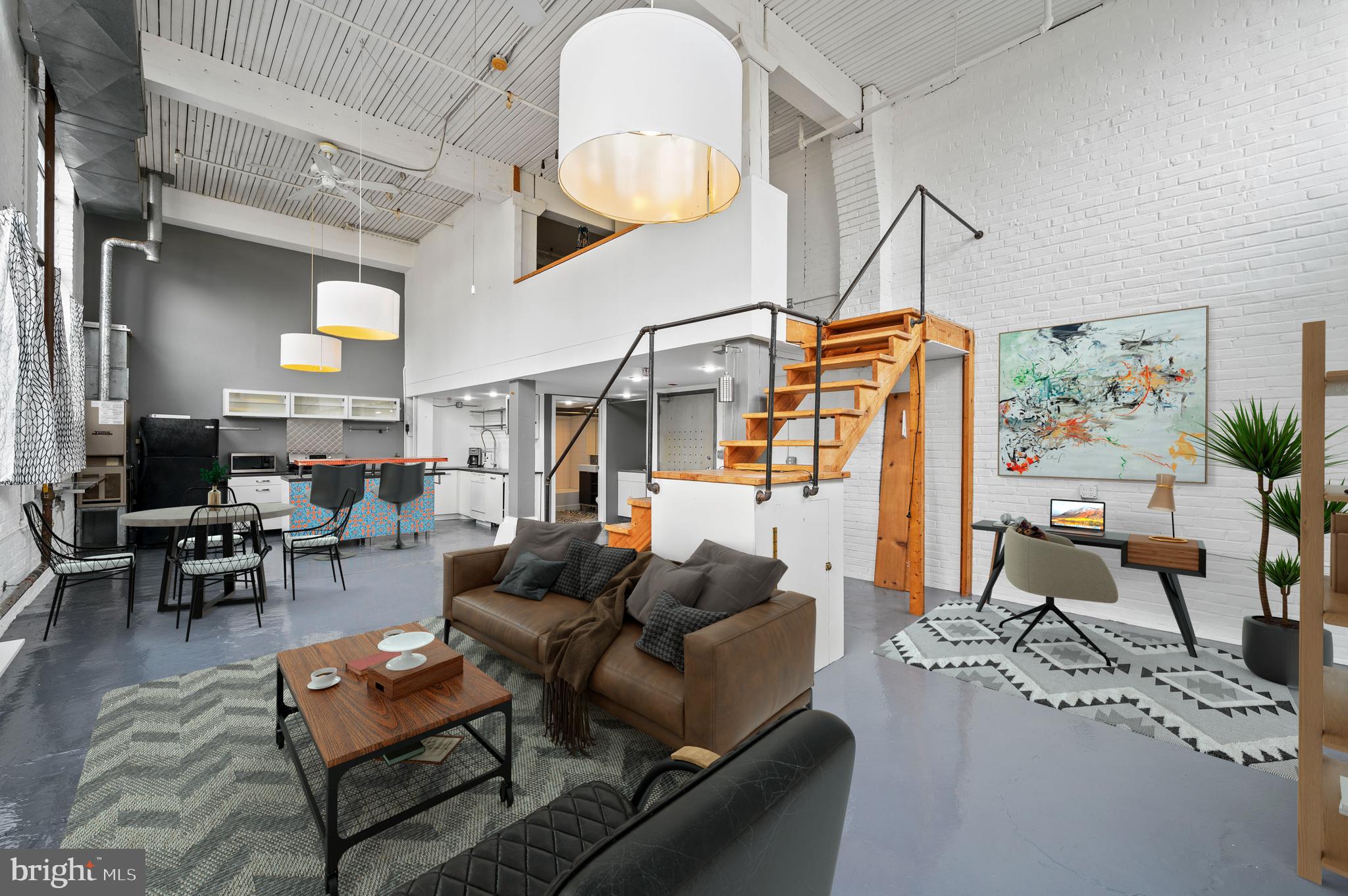 Unit 10 at the Greene Street Artists Cooperative is available for purchase!  Flooded with natural light and tall 15+ foot ceilings, this open floor plan with sleeping loft provides an ideal setting for artists looking for a bright creating space with two exposures and huge windows (some which were just replaced!)  5225 Greene St is a Co-Op live and work opportunity. You are purchasing into a share of the cooperative and are served a proprietary lease. Members must be active artists, with evidence of demonstrable prior and ongoing commitment to their work. Applicants for membership must submit, along with the application form, a resume and artistic biography. Note this is to ascertain commitment, not for esthetic judgment. Eligible arts include, but are not limited to visual arts: fine arts, crafts, design; literary arts; performing arts: theater, dance. Note: teaching, healing, music, and martial, are not qualifying arts for membership at Greene Street Artists Cooperative/Corporation.

Members must live in their co-op unit as their primary residence, and use the space for their artistic work.
Absentee ownership and/or rental of units as workspaces-only is not permitted.

Members must serve on at least one committee and participate in keeping management costs as low as
possible. Read the GSAC Handbook for a fuller understanding of GSAC participation requirements.

Unit is on the first floor and perfect for visual artists looking for ample natural light! Property has a garden and green space for members and visitors. Parking is not assigned but is plentiful.

Unit is available to be purchased with cash only. No financing available at this time.