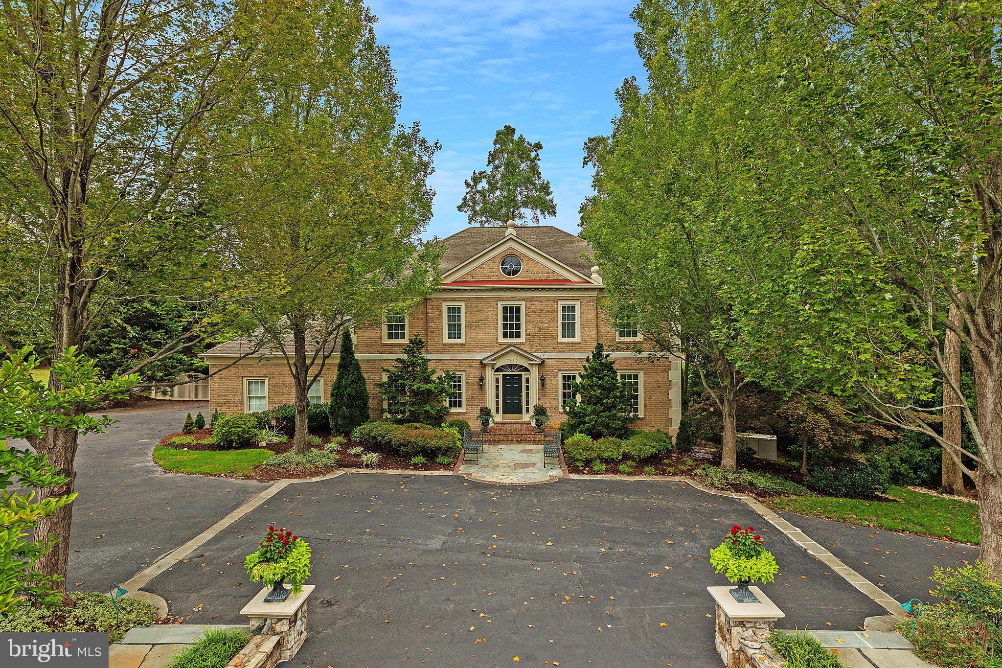 This 1.95 acre estate offers natural beauty and privacy. A brick main residence with a 3 car garage, a pool and a pool house are anchored by a circular driveway framed by extensive hardscaping including stone entry posts and a water feature.The traditional floorplan was custom built and designed for entertaining and everyday living.  A two-story foyer, flanked by a formal living room and dining rooms all with custom trim. The kitchen and breakfast room is open to an incredible two-story great room with a floor to ceiling stone fireplace. Privately located between the great room and the living room is a library with custom built-ins.Tmaster suite, which offers gracious closet space with an en-suite bath. Three generously-proportioned secondary bedrooms complete the upper floor, one bedroom with an ensuite bathroom and the other two bedrooms sharing a jack-and-jill bathroom. The walk-out lower level offers a multipurpose recreation room, full bedroom and bathroom, as well as a theatre, exercise room and bar.  The expansive rear deck offers beautiful tree-lined views of the heated pool with a hot tub waterfall and a pergola, pavilion with bar including a fireplace, outdoor shower, extensive patio areas and an outdoor bathroom    all are tucked behind the gated side entrance. A fantastic rear yard is beyond the pool and offers fantastic space with mature trees and green grass.