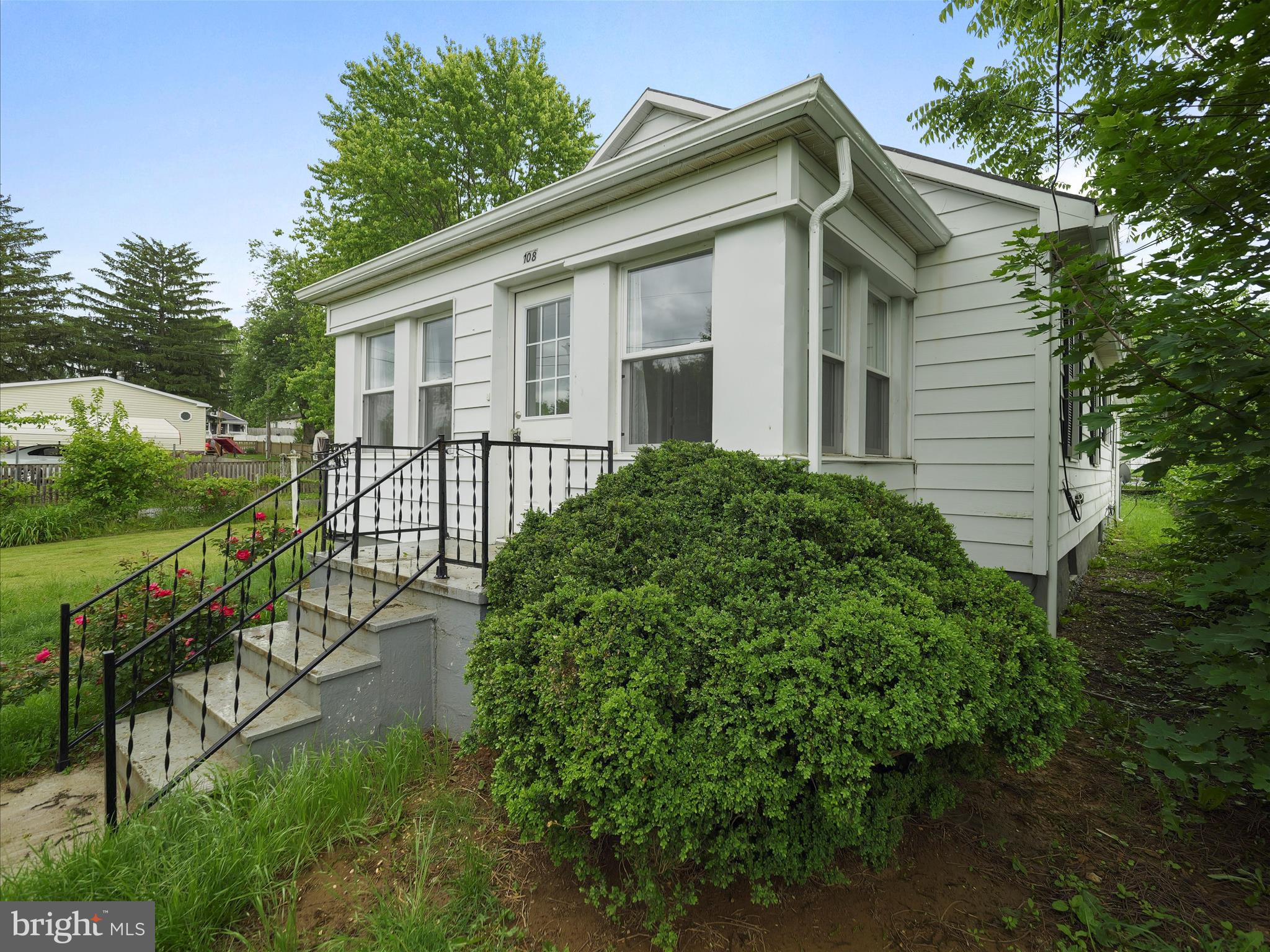 Welcome home to 108 E. 12th Ave! This charming 2 bedroom, 1 bath home is bigger then it looks! Front entry has lots of windows to let in the light. Kitchen is nicely updated with stainless appliances, white shaker cabinets and updated countertops. Family room off the kitchen gives added space to play or relax and opens to the rear covered patio.  Full unfinished basement and walk up attic for plenty of storage. Professional photos coming soon!