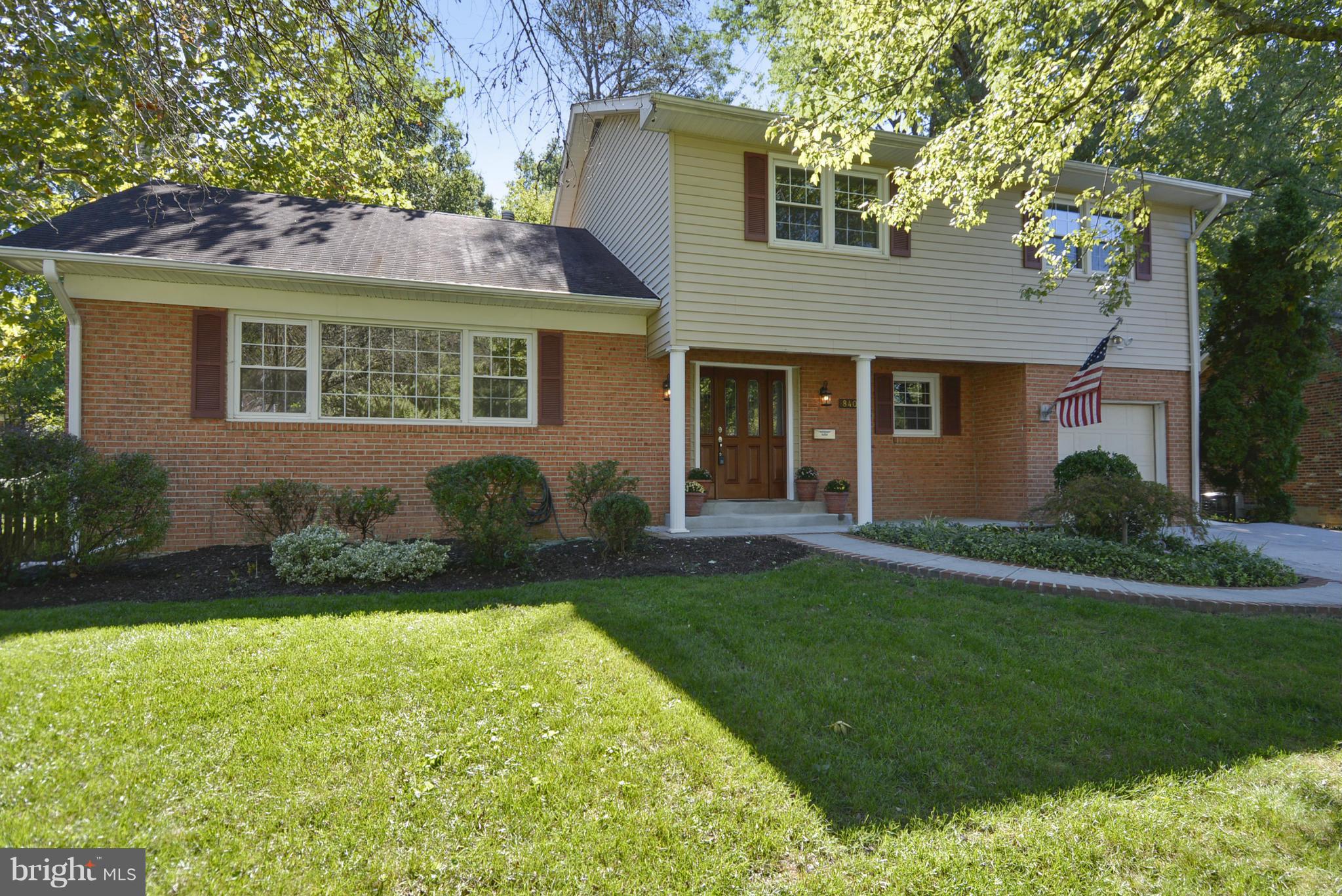 Gourmet kitchen w/granite counters, new stainless appliances, open floor plan w/ dining room off of kitchen, living room, family room w/ gas fireplace, wood floors on main and upper level, office/den on main level, large back yard with patio, fire pit & a pond.   Renovated baths, ceiling fans & a walk in attic.  Fully finished walk out basement with new carpet & powder room.  New Roof