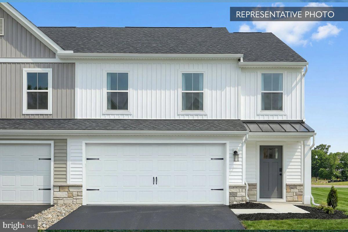 Buyers who use our preferred partners, will receive up to a $10,000 credit in the Selection Gallery to apply toward interior finishes. The home’s structural features are already in place, allowing you to focus on selecting the finishes that best fit your personal style. All interior selections must be completed by June 18th, 2026.

Welcome to 1030 Addie Lane, a beautifully appointed Jasmine end-unit townhome in the sought-after community of Elizabeth Village. This thoughtfully upgraded home lives larger than its footprint suggests, with premium selections throughout and the rare privacy and natural light that only an end homesite can offer.
From the curb, stone-to-sill detailing makes a striking first impression. Step inside to find EVP flooring flowing through the main living areas, where the alternate kitchen package takes center stage — a functional island layout with staggered cabinetry, granite counters, and under-cabinet lighting that makes this kitchen as beautiful as it is practical. Two 2'×2' picture windows flood the family room with natural light from raised heights, while recessed lighting and a gas fireplace create the perfect ambiance day or night. The primary suite on this same level features a walk-in closet and a beautifully finished bath with a raised double bowl vanity, quartz vanity top, upgraded plumbing fixtures, and a tiled 60" shower with wall tile to the ceiling and a semi-frameless sliding door.
Two additional bedrooms and a full bath round out the upper level.
The finished basement adds meaningful living space with a full bath, and a media chase keeps entertainment options clean and organized. Outside, a 10' × 14' Azek composite deck with steps to grade is ready for relaxing or entertaining.
Practical upgrades abound: zero entry garage with LiftMaster opener (7' door), wireless keyless entry keypad, and five prewired light fixture locations ready for future ceiling fans. Backed by Berks Homes' ten-year warranty, experienced Selection Gallery craftsmanship, and a dedicated pre-settlement process.

Backed by a 10-year Berks Homes warranty. Subdivision assessment pending; taxes based on completed home. Photos may include options or upgrades not reflected in list price and may be virtually staged. Specifications subject to change without notice.