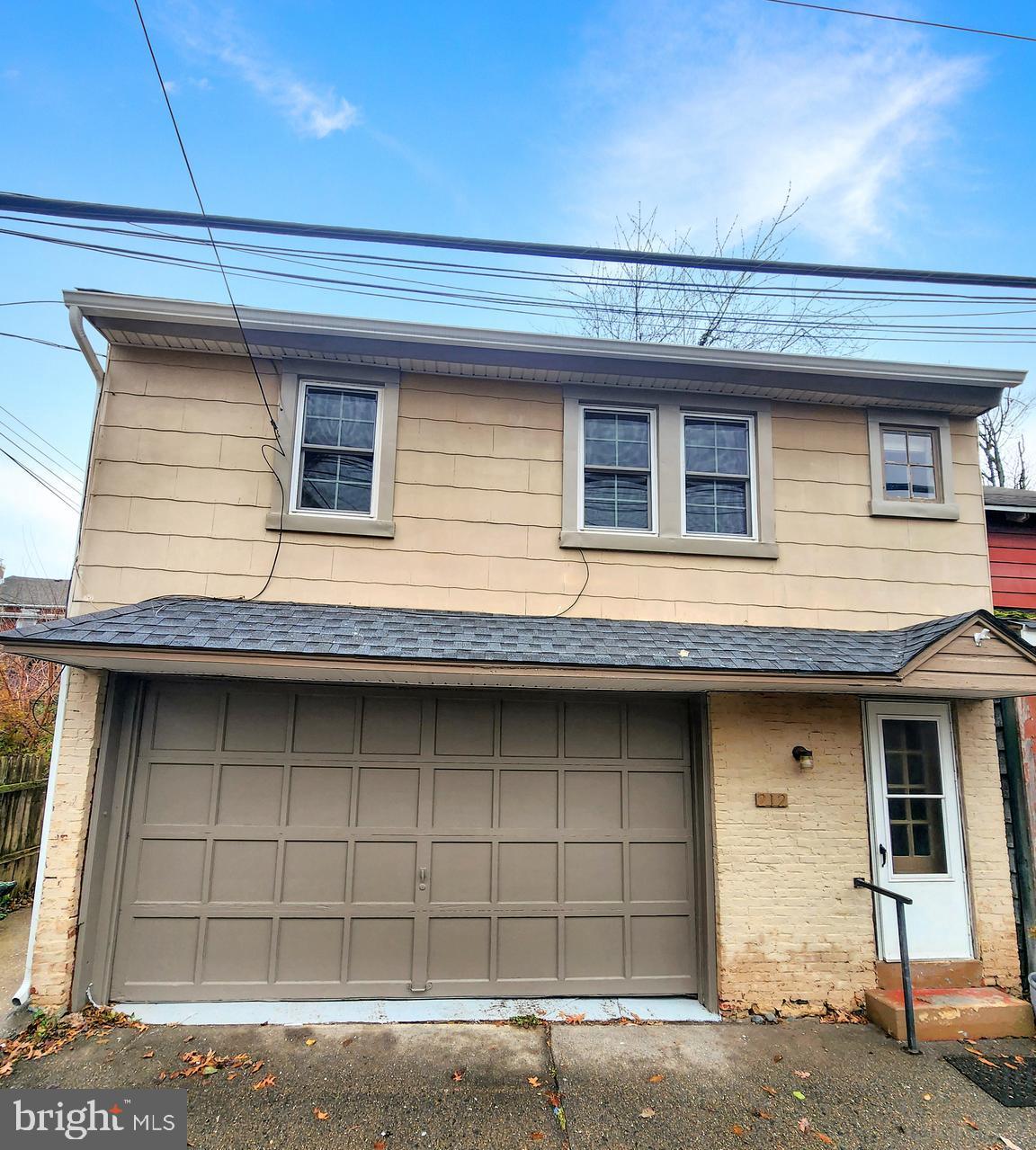 This renovated Carriage House is waiting for YOU! This unique, downtown home is just waiting for it's new tenant to move right in. This lovely home features beautiful hardwood flooring, a private screened-in porch and an oversized garage. Step right into the foyer of this home and travel upstairs to find a large Kitchen, recently updated with Granite countertops and new appliances. A large Dining Room is just ahead and features a coat closet. A spacious Living Room and Bathroom are just steps away. The Primary Bedroom is just ahead and features a nice-sized closet. Upstairs you will find a large second bedroom also with a closet.  Back downstairs awaits a large utility area with Laundry and storage. The icing on the cake is an oversized, hard-to-come-by garage! This home is just 4 blocks from Bridge Street and everything that Phoenixville offers. Wanna grab a cup of coffee or a late night movie at The Colonial? Want to go get ice cream at Brown's Cow? Just leave your car parked and walk downtown! Sorry, no pets! Make your appointment today!