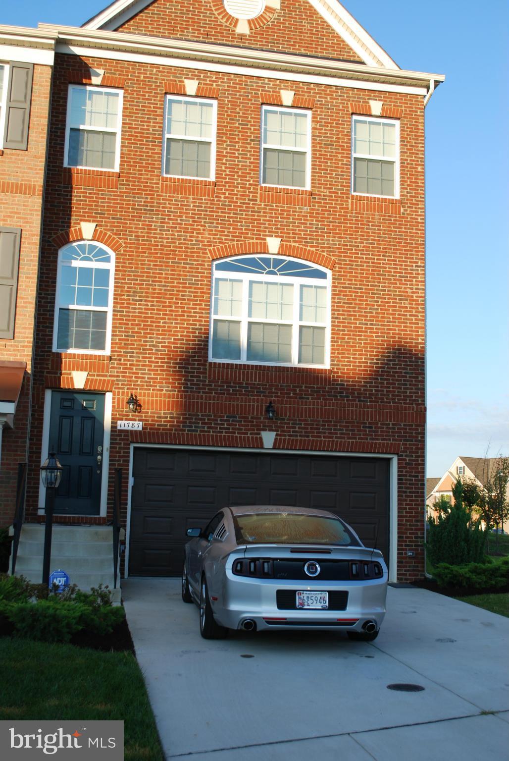 Amazing End Unit home,3 levels,  close to commuter lots, Baseball stadium. and new schools. Granite counter tops, fresh paint, 2 car garage, privacy deck. Recessed lighting and much more....