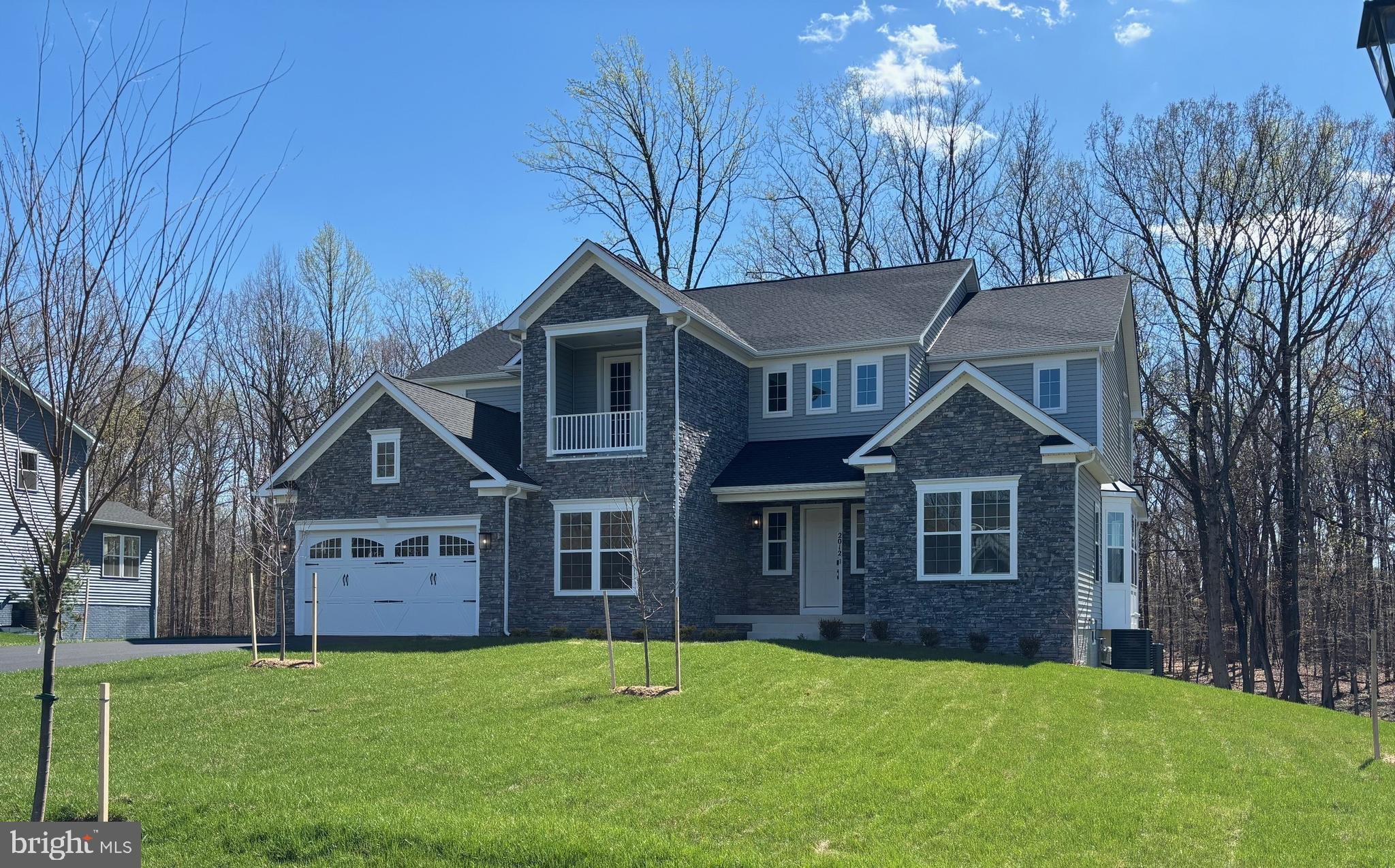 Seller offering closing costs incentive. Please contact builder for more information. Explore this impressive Harmon home, ready to move -in. Included features an inviting over size deck with step to grade, a comfortable living room, a formal dining room, a Professional kitchen with all upgraded appliances, a spacious great room with an electric fireplace, a convention powder room , large pantry walk - in , a lavish suite boasting a private retreat , a deluxe bath and an immense walk-in closet , three additional bedrooms, including one with a private bath and a finished basement showcasing a spacious rec room , a bedroom with a full bath walk - in closet, Visit today !