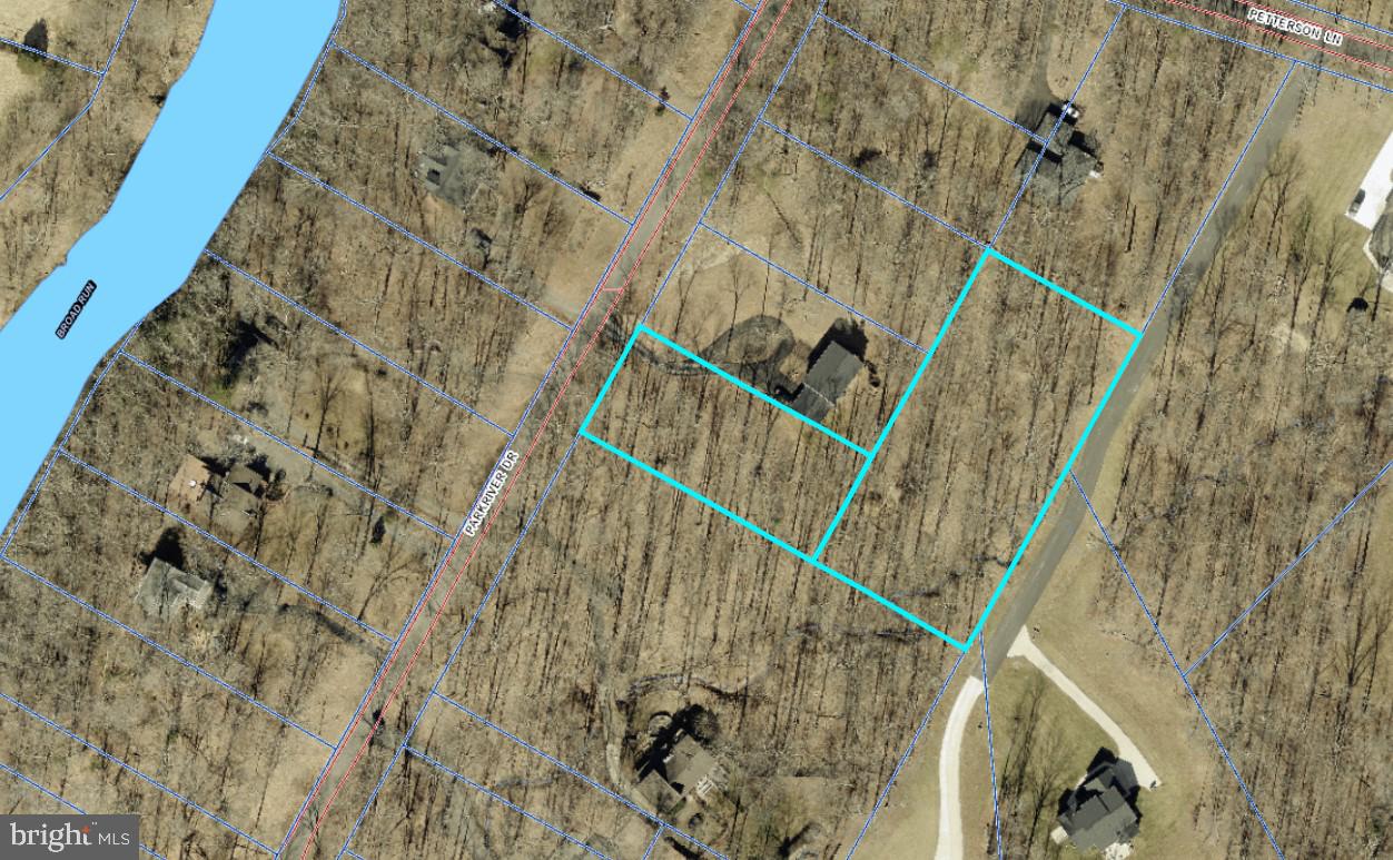 Big Price Drop.  Two residential single family lots sitting on 1.5 acres of land.  A unique opportunity to create your own private retreat with Broad Run just across the street. The lot is situated in a quiet, established area and will be served by a private well and septic.  Soil study indicates both lots combined can be used for one (1)  4 Bedroom Alternative/ Trench Septic estimated at $25-27k . Petterson  Ln lot can be used as an accessory dwelling unit.  NO ACCESS off Petterson.  Go  12009 Parkriver Dr to see sign on property.  Take aerial for tour. 

GPINs: 7793-37-1037 & 7793-37-2734.