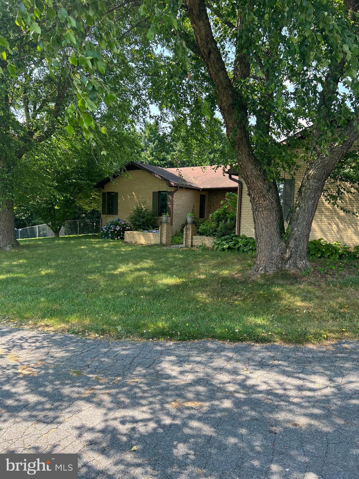 ....PRICE CHANGE TO $4780. FOR ENTIRE FARM........HIGH ON A KNOLL, OVERLOOKING SUGARLOAF MOUNTAIN............ ...........LARGE OPEN ......................AND THE HOME IS FOUR BEDROOMS....3 BATHS......ONE LEVEL LIVING WITH A WONDERFUL ONE BEDROOM APARTMENT WITH KITCHEN IN THE LOWER LEVEL.   
ENTER THE HOME AT THE LARGE FOYER, OR FROM THE TWO CAR GARAGE.  LOTS OF NATURAL WOODWORK THRU-OUT HOME..........FLOOR PLAN FLOWS NICE........OPEN KITCHEN ADJOINING FAMILY ROOM, WITH HUGE OUTDOOR DECK ACCESSIBLILITY.
URBANA SCHOOL DISTRICT!.........