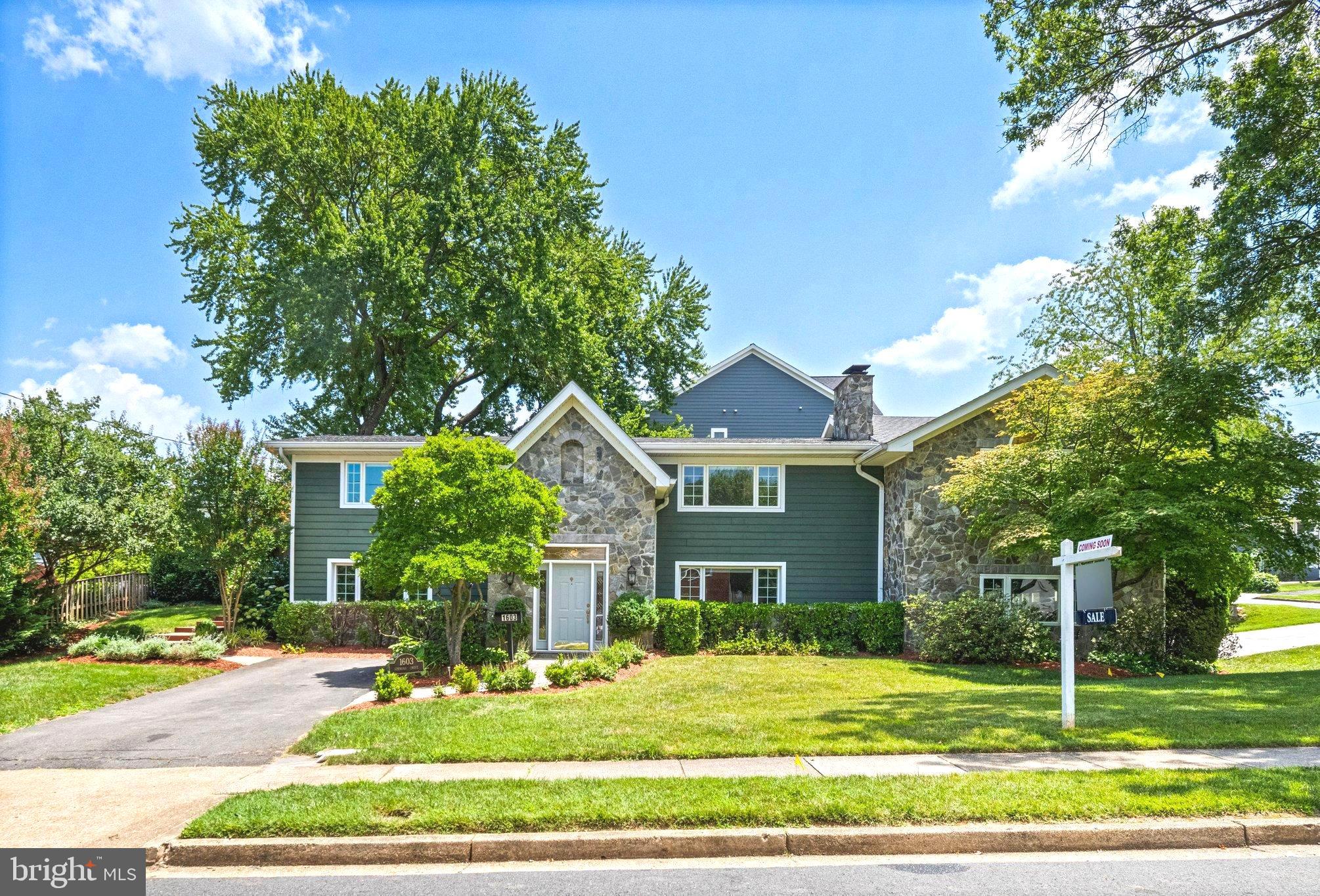 Tucked on a .3+ acre lot in the quiet neighborhood in the heart of McLean, this one-of-a-kind home was just updated in 2026 (see details below) and completely remodeled in 2005.  With 4 bedrooms and 4 full bathrooms across 3,800 square feet on two levels, the home features natural stone and Hardiplank (a 50-year material) on the exterior. Within walking distance of McLean High School and just minutes from shopping, entertainment and easy access to all the DMV.
- This beautifully updated home delivers a rare combination of main-level primary suite living. The main-level primary suite is a true retreat, with generous proportions, a large walk-in closet, and a full bath alongside it. A gas fireplace and French doors open directly to the living room—ideal as a guest suite, home office, or space for multigenerational living.
- Upstairs, the gourmet kitchen opens seamlessly to a sun-filled breakfast area, with a bay window overlooking the backyard and ample cabinetry. It flows into an inviting family room with a gas fireplace and a sliding glass door to the deck—an effortless layout ideal for everyday living and entertaining alike. A formal living room and separate dining room with large windows round out the primary gathering spaces.
- The main level is complete with a powder room, laundry room, and the two-car side-load oversized garage.
2026 Updates : New AC, Fresh paint throughout the entire house, New flooring on the main level, All-new kitchen appliances, New washer and dryer.
- The location can’t be beat: minutes to Tysons Corner, the Silver Line Metro, I-495, Georgetown Pike, Reagan National and Dulles International airports, Scotts Run, and Great Falls National Park.
- This home has been loved. The fully landscaped backyard offers an escape from the daily grind—sit on the raised deck and relax. It’s truly an oasis.