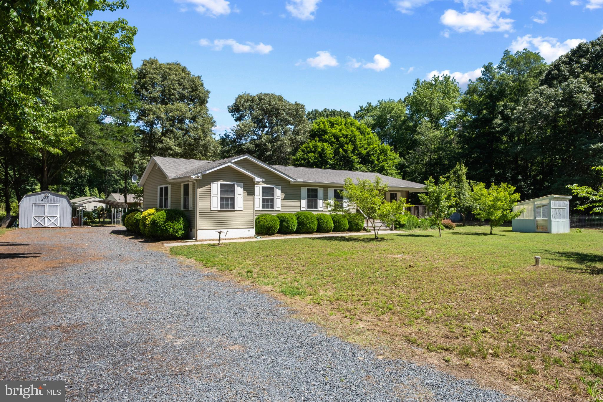 Welcome to 23116 Gilpin Point Road in Preston, an updated Eastern Shore rancher offering the perfect blend of one floor living, privacy, history, and water oriented lifestyle. Beautifully situated on a spacious setting in the historic Gilpin Point area, this inviting home provides a peaceful country backdrop while still offering convenient access to nearby towns, commuter routes, and the gorgeous Choptank River. Steeped in the rich heritage of the Gilpin Point estate area, this property offers a special connection to one of the Eastern Shore’s most historic riverfront communities.
Inside, this updated rancher offers the ease and comfort of true one level living with a thoughtful layout designed for everyday convenience. The spacious living area creates an inviting place to gather, relax, and unwind, while the eat in kitchen provides excellent functionality with comfortable dining space and easy flow to the main living areas. The private owner’s suite offers a peaceful retreat with its own full bath, while the additional bedrooms provide wonderful flexibility for family, guests, a home office, craft room, or hobby space. A large laundry and utility area adds valuable storage and practical convenience, keeping everything easily accessible on one level. With generous room sizes, a comfortable layout, and no stairs to navigate, this home is ideal for buyers seeking low maintenance living without sacrificing space, privacy, or charm.
The exterior setting is one of the true highlights of this special property. Surrounded by mature trees and open outdoor space, the home offers a peaceful Eastern Shore setting with established garden areas, fruit bearing trees, and plenty of room to enjoy outdoor living. Whether you envision gardening, entertaining, relaxing around a fire pit, storing a boat, raising chickens, creating a hobby space, or simply enjoying the quiet surroundings, this property delivers wonderful flexibility. The fenced areas, greenhouse space, storage shed with electric, and additional outbuilding space add tremendous value for those who enjoy outdoor projects, recreation, or extra storage. With easy access, generous parking, and room to spread out, the property feels private and tucked away while still being convenient.
Less than five blocks away, Ganey’s Wharf provides access to the beautiful Choptank River, creating an incredible opportunity for boating, fishing, kayaking, crabbing, picnics, or simply enjoying peaceful waterfront views. This is not just a home, it is a lifestyle. Private, peaceful, updated, and full of Eastern Shore charm, 23116 Gilpin Point Road is an incredible opportunity for buyers seeking one floor living, outdoor space, nearby river access, historic character, and everyday comfort. Truly one of the best values for amazing
Private, peaceful, and full of Eastern Shore charm, this updated rancher is an incredible opportunity for buyers seeking acreage, nearby water access, true one level living, and a setting that feels tucked away while still offering excellent regional convenience. Ideally located with access to Easton, Denton, Cambridge, Annapolis, Baltimore, Washington, D.C., Middletown, Dover, Dover Air Force Base, Routes 50 and 301, the Bay Bridge, Kent Island, and Delaware shopping, this property delivers the best of both privacy and accessibility. A wonderful value and an amazing opportunity to enjoy the very best of Eastern Shore living.