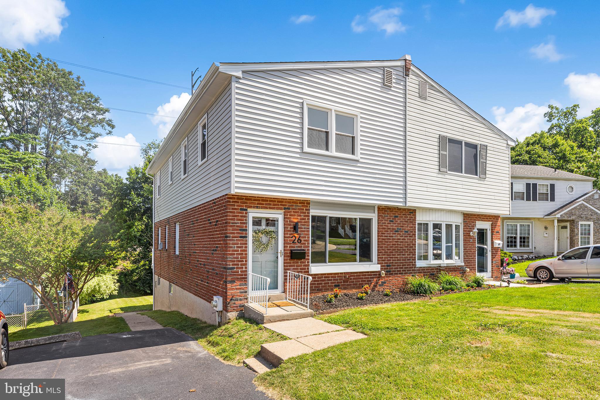 Welcome to this stunning fully renovated 3-bedroom, 1.5-bath twin in the heart of Ridley Park, where exceptional curb appeal immediately sets the tone for what’s inside. Step through the front door and you’re greeted by gorgeous refinished hardwood flooring and a bright, open-concept layout perfect for modern living. The spacious living room seamlessly flows into the dining area, creating an inviting space for entertaining and everyday comfort. The beautifully renovated kitchen is truly the centerpiece of the home, featuring brand-new stainless steel appliances, quartz countertops, a farmhouse sink, and eye-catching custom tilework. Just off the kitchen, enjoy outdoor living on the brand-new oversized deck overlooking the large backyard. A convenient first-floor powder room adds both style and functionality.
Upstairs, you’ll find three generously sized bedrooms with ample closet space and a stunningly renovated full bathroom showcasing elegant tile finishes and modern fixtures. The large finished basement offers additional living space ideal for a family room, home office, or gym, along with a separate utility room featuring laundry and plenty of storage. This home has been completely renovated from top to bottom with all the major upgrades already done for you, including a brand-new HVAC system, roof, siding, windows, electrical, plumbing, and deck. Conveniently located near Ridley Park’s popular dining, shopping, and recreational attractions, this home also offers easy access to I-95 and Route 476, making any commute a breeze. This is truly a move-in ready home that combines timeless charm with today’s modern finishes.