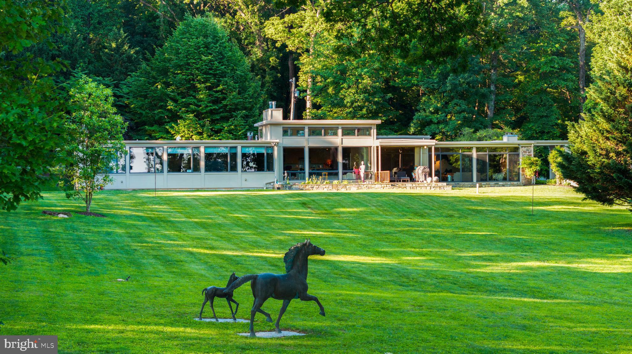 ESSENCE
Live authentically. A striking mid-century modern estate set on 3.69 acres in the coveted Caves Valley. Extraordinary views of Caves Valley Golf Course in the distance. Long horizontal lines and walls of glass dissolve the boundary between indoors and the cascading woodlands. Every space magnificently sited to capture the scenery. Enduring architecture for our times. Spaces that make you pause and want to be there. Covered walkways connect the wings of the house. Expansion without interruption. This breathtaking setting is optimized by the artistic footprint of the house that creates inviting courtyards which punctuate the landscape. Whether it's sunrise or sunset, choose your terrace. A very private and generous luxury guest suite exists on the first floor. It lives as two houses within one. Embrace the ease of a one level lifestyle. The finished lower level offers a multitude of functionality. Venture to the great outdoors... swim laps and grill under the stars. Shaded pergola and outdoor kitchen ideal for long summer evenings with fireflies and friends. Cultivate your existence. The art of uniting human and home.
Listing does not include 1.066 acre lot 

LOCAL FLAVOR AND PROVISIONS
John Brown Store, Graul's Market, and Wegmans. Favorite local dining at The Milton Inn, The Oregon Grill, The Valley Inn, Peerce's, The Butler Cabin, and The Filling Station. An exit north offers dining at Casa Mia’s, Manor Tavern, The Fill'Er-Up, Woodfire Kitchen and The Creamery Connection. Tap into local breweries, such as Inverness Brewing, Farmacy Brewing and Big Truck Farm Brewery.

OUTINGS AND LEISURES
If you love the outdoors, Soldiers Delight Natural Environment Area is a rare geological ecosystem with serpentine soil that was actively mined for chromite in the 19th century. Oregon Ridge Park is perfect for hiking and picnics. Plus, the park provides a beautiful fishing lake. The park also hosts events and concerts during the summer. Explore the NCR Trail. A 21-mile flat, crushed-stone trail open to hikers, bikers, and horses, it runs along the scenic Gunpowder Falls river. Prettyboy Reservoir is open to hiking, rowing, or paddle boating, bird watching, horseback riding and nature photography year-round, and for archery hunting during a regulated season. Go tubing on the Gunpowder River. Enjoy Ladew Topiary Gardens... these gardens are 22 acres of spectacular, award-winning gardens, more than 100 remarkable topiaries, a mile-long Nature Walk, and native Butterfly House. Explore The Manor Mill, a pre-revolutionary grist mill that now houses a wide variety of art and entertainment events. Tee off at Caves Valley Golf Club, Hunt Valley Country Club or Hayfields Country Club. Visit The National Lacrosse Hall of Fame and Museum which honors the history and legends in the sport. 

PROXIMITY
Zippy access to the I-83 on ramp, about 18 minutes to Hunt Valley, and about 22 minutes to Towson. Approximately 41 minutes to BWI and 22 minutes to Penn Station.

REGION
Owings Mills is home to the Under Armour Performance Center, which serves as the official year-round training camp and practice facility for the Baltimore Ravens. It is where players train, the team is headquartered, and football operations happen.
