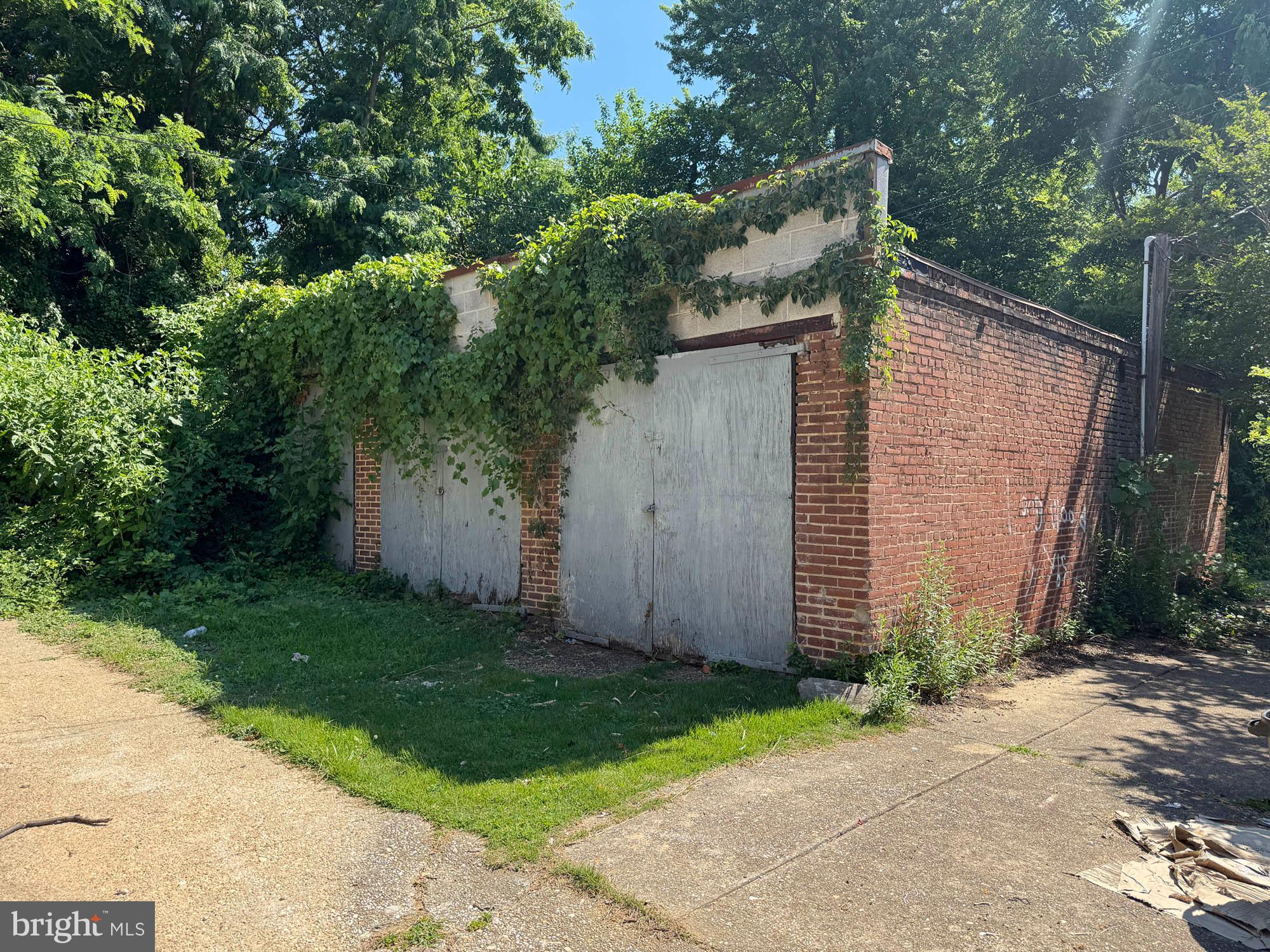 ONLINE REAL ESTATE AUYCTION TO THE HIGHEST BIDDER OVER $10,000!! Online Bidding Opens - Tuesday, July 7, 2026. Online Bidding Closes - Thursday, July 9, 2026 at 12:30 PM. List price is opening bid only. One-story concrete masonry garage building located in the Walbrook neighborhood of West Baltimore. The structure is arranged as three separate parking or storage areas, each with secure exterior access. The property has been used for storage and garage purposes and sits on a rectangular shaped lot with dual alley access. Located between North Avenue and Gwynns Falls Parkway, near Hilton Street, the property provides convenient access to users to all parts of west Baltimore. With alley access on both sides, multiple secure bays, and proximity to dense residential blocks and major commuter routes, the auction presents an opportunity to acquire a functional, small-footprint building suitable for garage rentals, contractor storage, vehicle parking, or potential redevelopment in a well-positioned West Baltimore location.