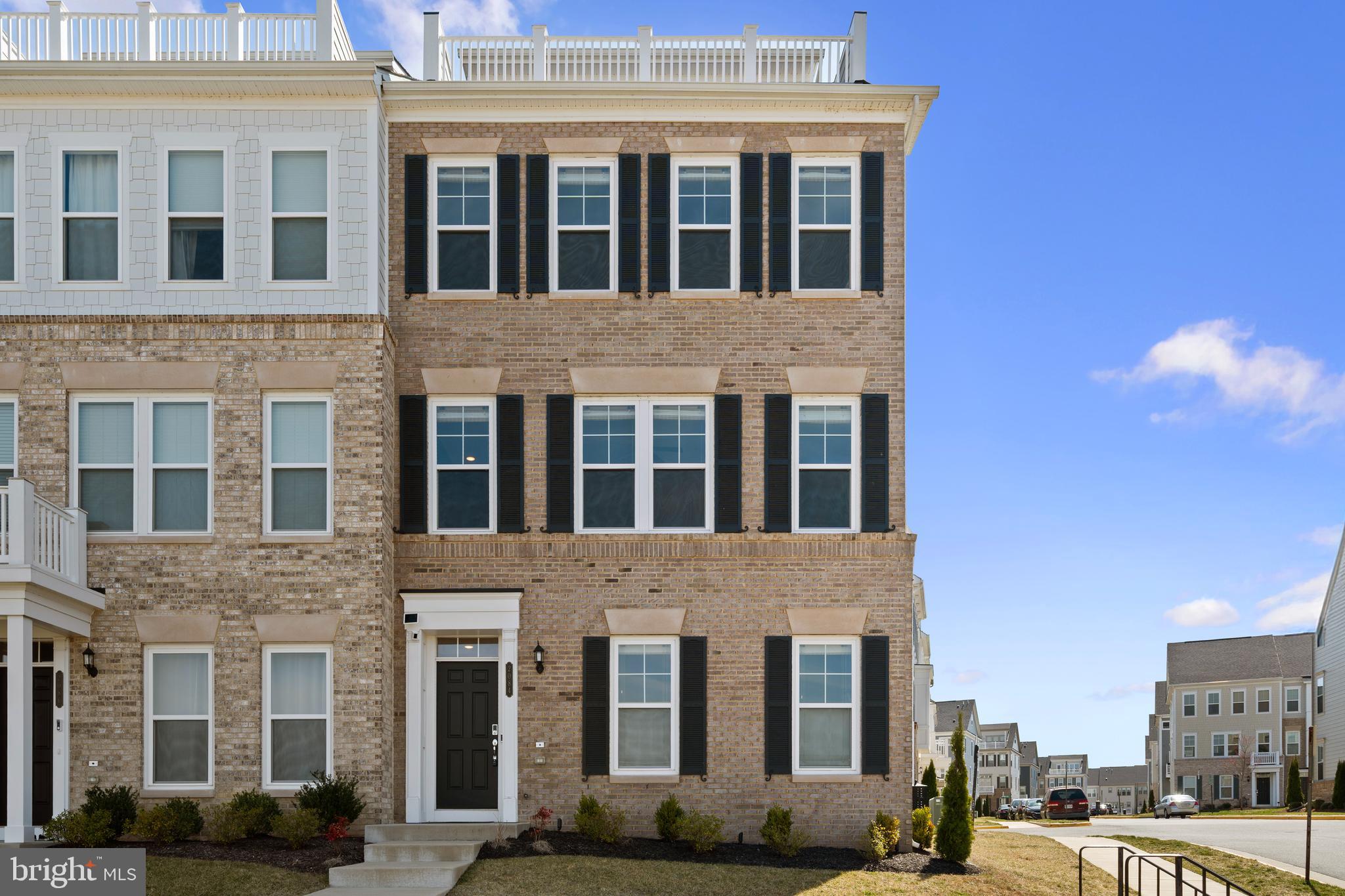 Welcome Home to Potomac Shores! This stunning 3-bedroom, 3-bath end-unit home offers a spacious and inviting layout with an upper-level Room featuring a wet bar and wine fridge—ideal as a fourth bedroom or a relaxing lounge area. Enjoy the expansive balcony with gorgeous views. Large windows fill the home with natural light, creating a warm, welcoming atmosphere.

The open-concept main level boasts a spacious living area, dining room, and a chef's kitchen complete with abundant cabinet space, stainless steel appliances, and sleek granite countertops.

Upstairs, the owner’s ensuite offers dual vanities and a luxurious large shower with a built-in seat. Two additional bedrooms and another full bath complete the upper level. Recent updates include fresh paint, an epoxy floor in the garage with added lighting throughout , a whole-home humidifier, kitchen cabinet lighting, a bidet in the owner's suite, surround sound wiring, a Wi-Fi mesh system, stairwell motion lighting, and solar-powered security cameras on the perimeter.

Every morning, the sun spills into every corner of the home, offering scenic views of the golf course and the lush Potomac Shores grounds, a daily reminder of nature's vibrant appeal.

Community Amenities include the Shores Club with a pool and fitness center, the Potomac Shores Golf Club, the Tidewater Grill, a community garden, and a kids' club. Additionally, a future Potomac Shores Marketplace is planned, and the Potomac Shores VRE Station is set to open in the 4th quarter of 2025, bringing even more convenience to this already fantastic location!