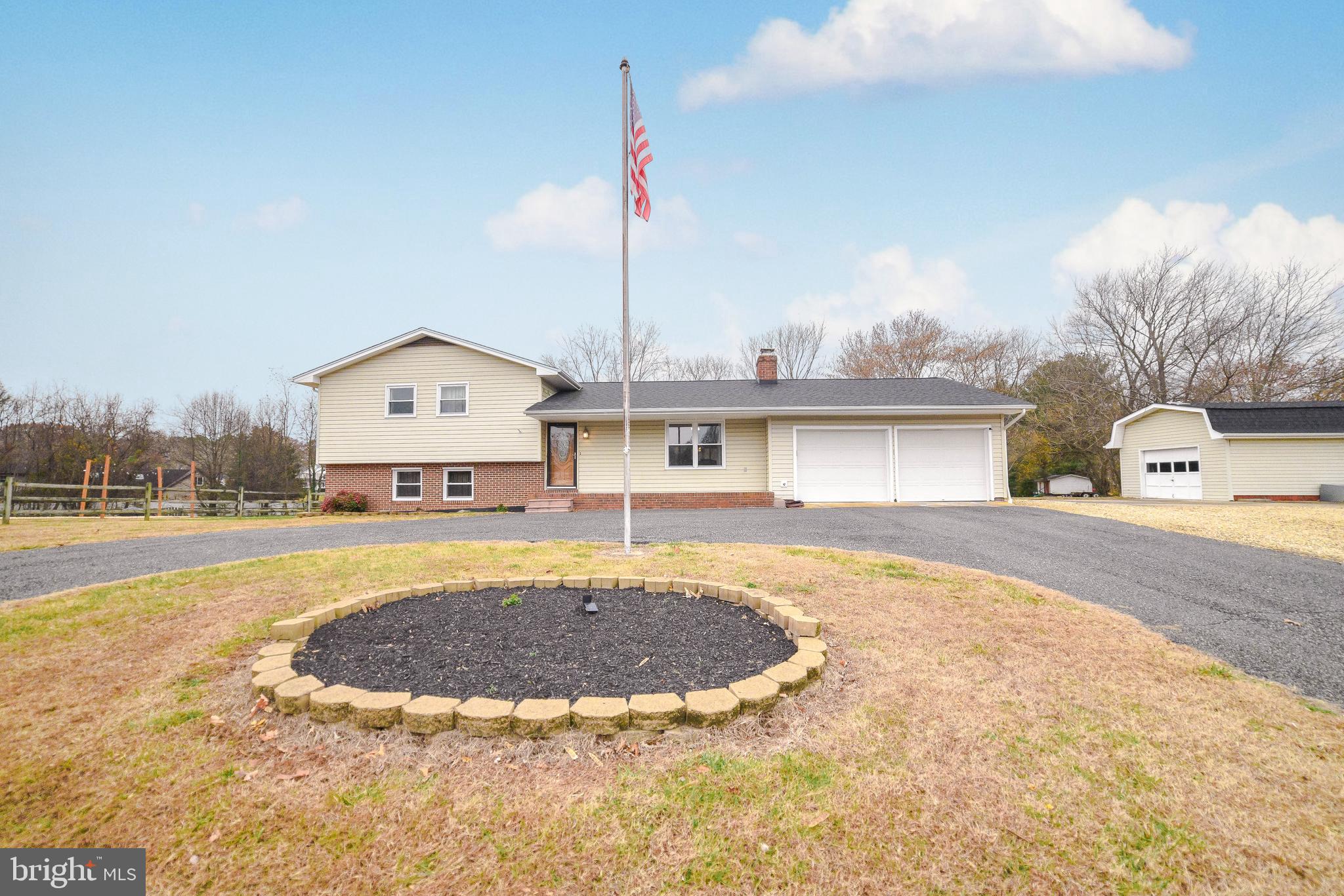 Will not last long!!! Beautiful updated 3 finished level split level. Open floor plan , with gas  fireplace as well as a pellet stove downstairs. Screened in porch which can be enclosed in the winter. Trane heat pump, tilt out windows .  Living room and separate family room. Walk out basement. 1.84 wide open lot. Plenty of parking. 21 x 28 oversized garage with mechanic's area.  HVAC approx. 4 years, roof approx. 9. Circular driveway with lots of parking. 16x32 shed.