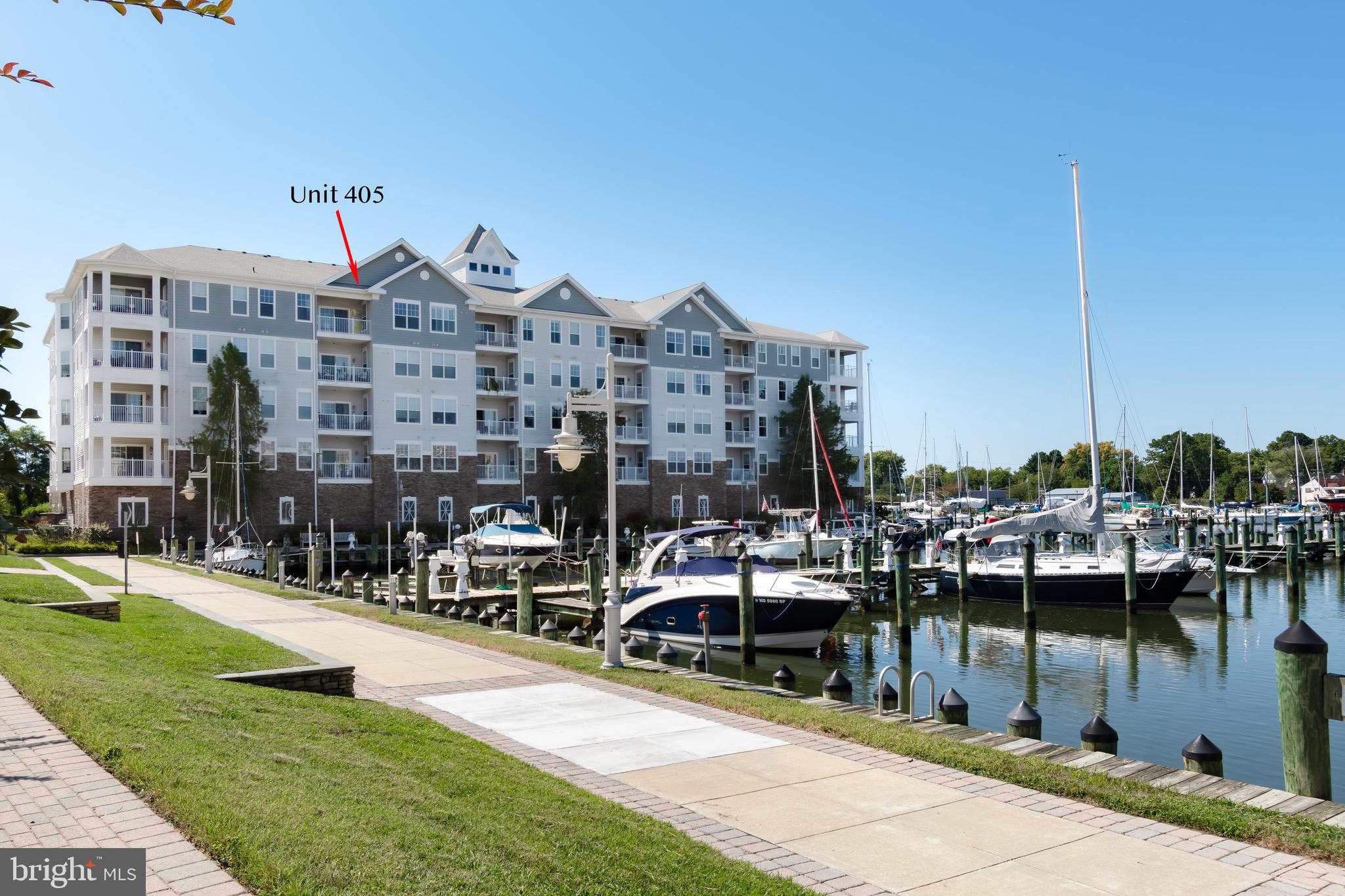 New Price! Enjoy the ease of condominium living  and spectacular city views , the harbor and beyond from this top floor unit located in the gated community of Deep Harbor with pool and assigned garage parking.  Situated just minutes from downtown restaurants and shops, this floor plan offers two bedrooms, two baths, spacious kitchen and separate dining room as well as ample storage space and lots of windows. Virtual staging was utilized.