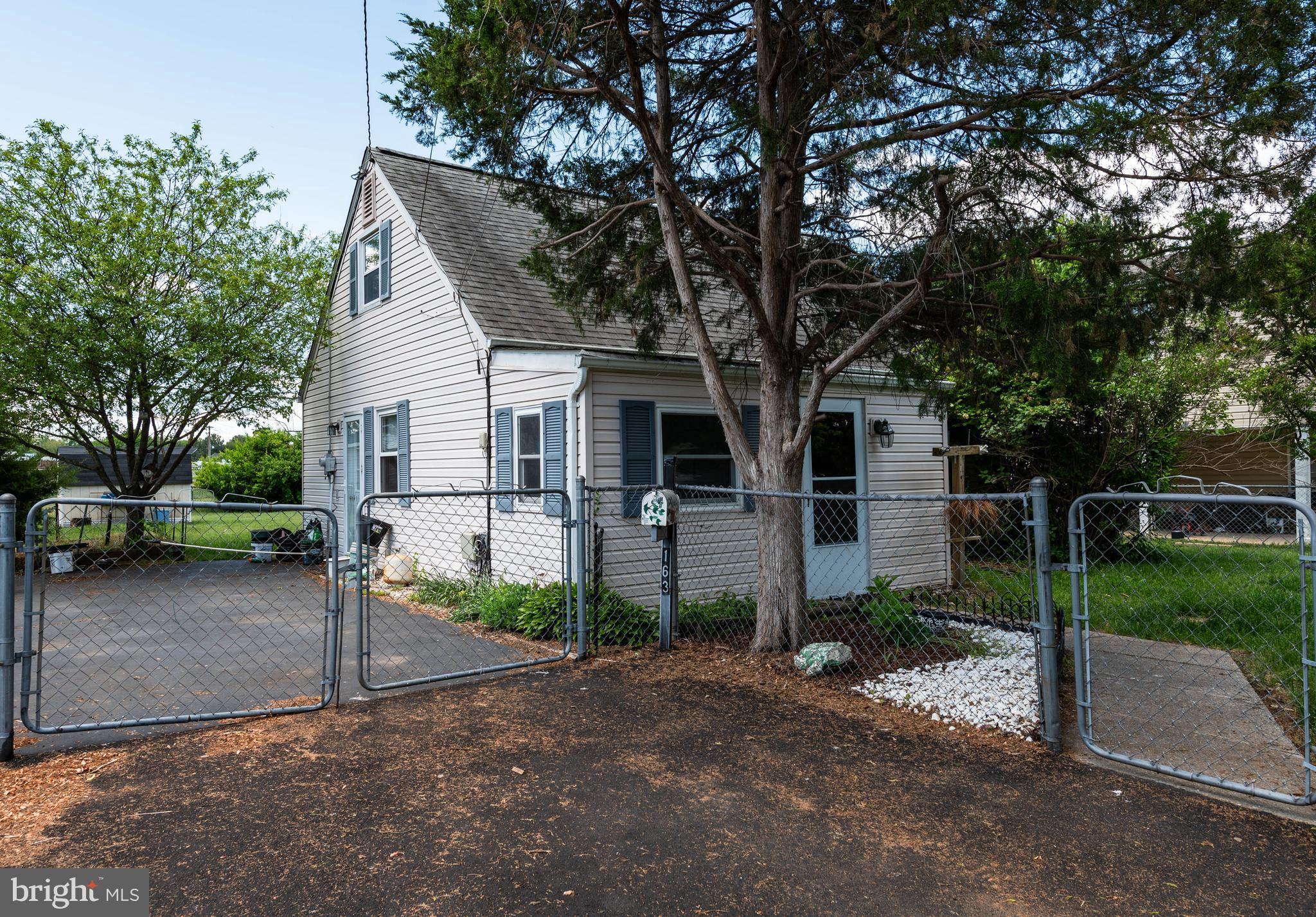 Nestled in the charming community of Manassas Park, this delightful Cape Cod home offers a perfect blend of comfort and convenience. Built in 1955, this well-maintained residence features three spacious bedrooms and a full bathroom, providing ample space for relaxation and gatherings. The inviting layout is complemented by a generous 0.2-acre lot, ideal for outdoor entertaining, activities or gardening. Manassas Park is known for its friendly atmosphere and vibrant community spirit. Residents enjoy easy access to local parks, perfect for weekend picnics or leisurely strolls. The neighborhood boasts excellent public services and is conveniently located near schools, ensuring a supportive environment for lifelong learning. With nearby shopping and dining options, everything you need is just a short drive away. This home is not just a place to live; it's a gateway to a warm and welcoming community where memories are made. Experience the charm of Manassas Park and make this lovely home your own! Recently updated kitchen and bathroom and new flooring throughout. Conveniently located near Rt28, Shopping, restaurants, public transportation and VRE all within a 1-mile radius.