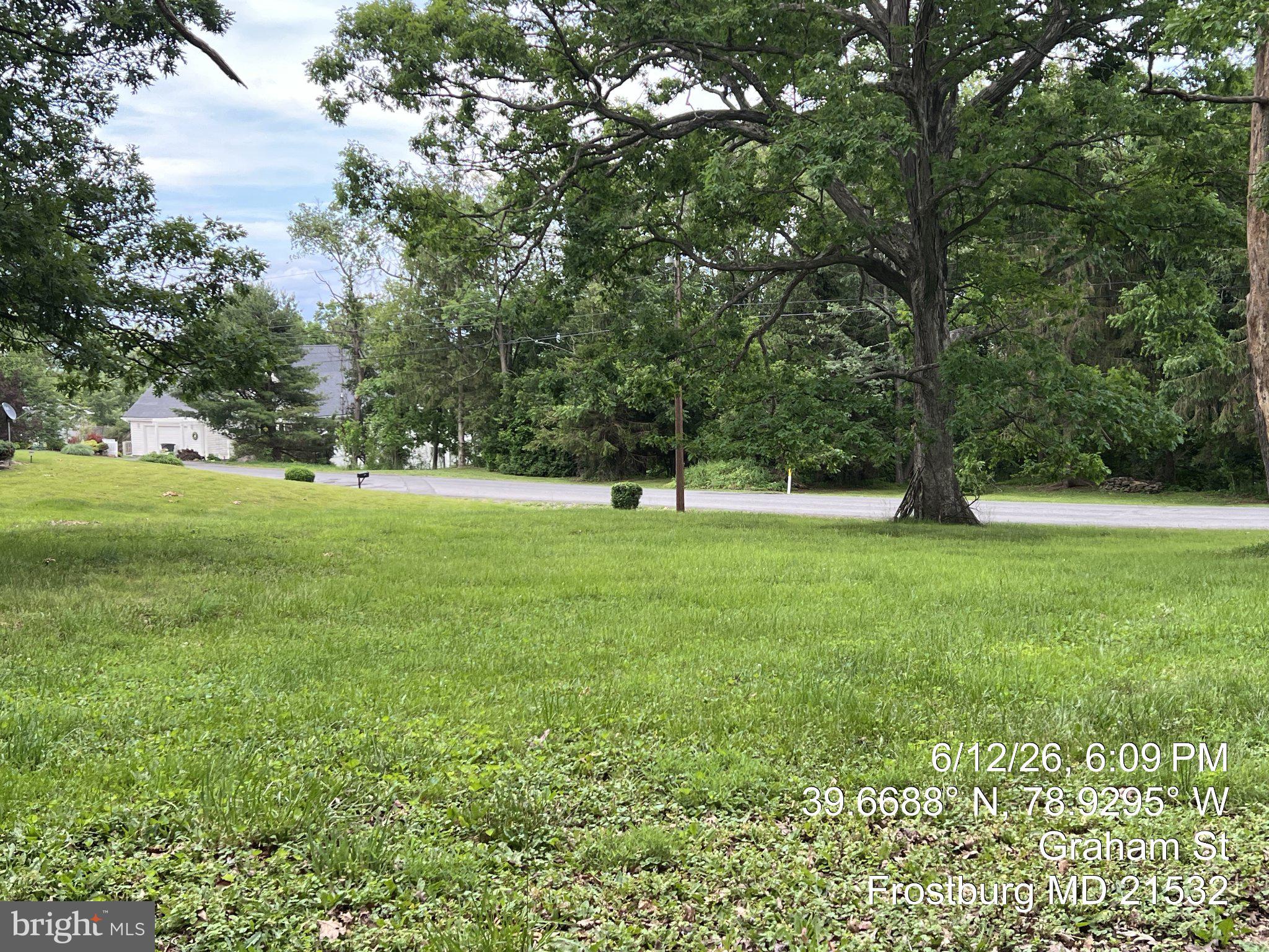 Great corner lot nearly level just waiting for your new home. Public water and sewer are available please contact local municipalities for cost. Electric at or near site, also please contact for cost. Beautiful home site!. Some mature trees could incorporate into home location if desired. All costs/ and inspections to build are to be obtained by buyer at buyer's expense.