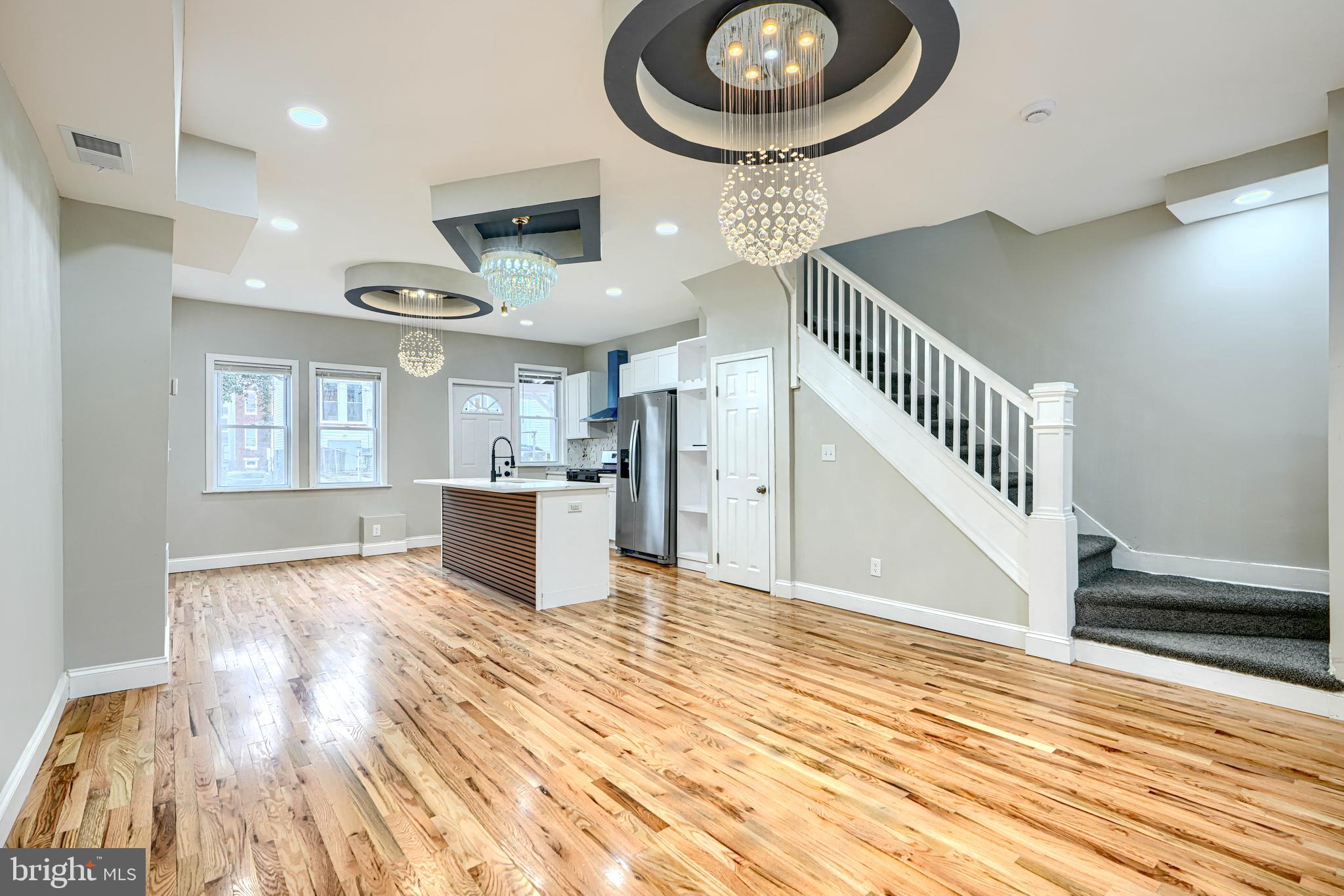 Wake up every morning and say “I can’t believe I live in this amazing house!” Renovated home with so many upgrades: Open layout, Beautiful designer light fixtures, Hardwood flooring, Gorgeous kitchen with Island, Calacatta Quartz countertop, coordinating backsplash, wood shaker cabinets, and stainless steel appliances. Upstairs bath is elegant and comfortable, with Floating Vanity and custom tilework. Fully finished basement can be used as a family room or 4th bedroom, full bathroom with another Floating Vanity, and laundry area. This home features coordinated lighting and plumbing fixtures, new doors interior and exterior, new replacement windows, recessed lighting, HVAC,  covered porch. You will love this home.
