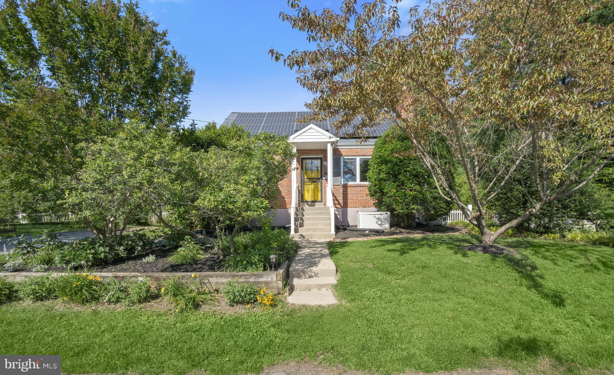 Nestled on more than a quarter acre in Beltsville's sought-after Chestnut Hills community, this classic brick Cape Cod combines timeless character with thoughtful updates throughout and offers three finished levels of comfortable living space. Hardwood flooring extends across the main level, where a welcoming living room sets the tone with crown molding, a cozy fireplace, and a triple casement picture window that fills the space with natural light. Just beyond, the updated eat-in kitchen features granite countertops, a tile backsplash, and stainless steel appliances, including a gas range. A sliding glass door opens to the screened porch, complete with a ceiling fan and easy access to the backyard, creating an ideal setting for outdoor dining and relaxation. The main level also includes a spacious primary bedroom with a walk-in closet and private en-suite bath, along with a second full bath showcasing classic black-and-white tile. Upstairs, two additional bedrooms provide comfortable accommodations with the charm and character expected in a Cape Cod design. The finished lower level expands the home's versatility with a recreation room featuring walkout stairs to the backyard, a bonus room well suited for a home office, exercise space, or hobby room, and a laundry room offering additional storage and convenience.
Outside, mature landscaping, attractive brick walkways, and garden beds enhance the property's curb appeal. The spacious backyard is fully fenced and includes a patio, storage shed, and plenty of room to enjoy outdoor activities. Recent improvements add peace of mind and efficiency, including solar panels, an updated roof, water heater, and backup generator. Conveniently located near local schools and the library, the home also enjoys easy access to shopping, dining, and recreation. Nearby destinations include Costco, Ikea, MOM's Organic Market, Calverton Shopping Center, College Park Market Place, Beltsville Neighborhood Park, Beltsville Community Center, and Vansville Recreation Center. Commuters will appreciate quick connections to Route 1, I-95, the ICC, and the Capital Beltway, providing convenient travel to Washington, D.C., Baltimore, and surrounding employment centers.