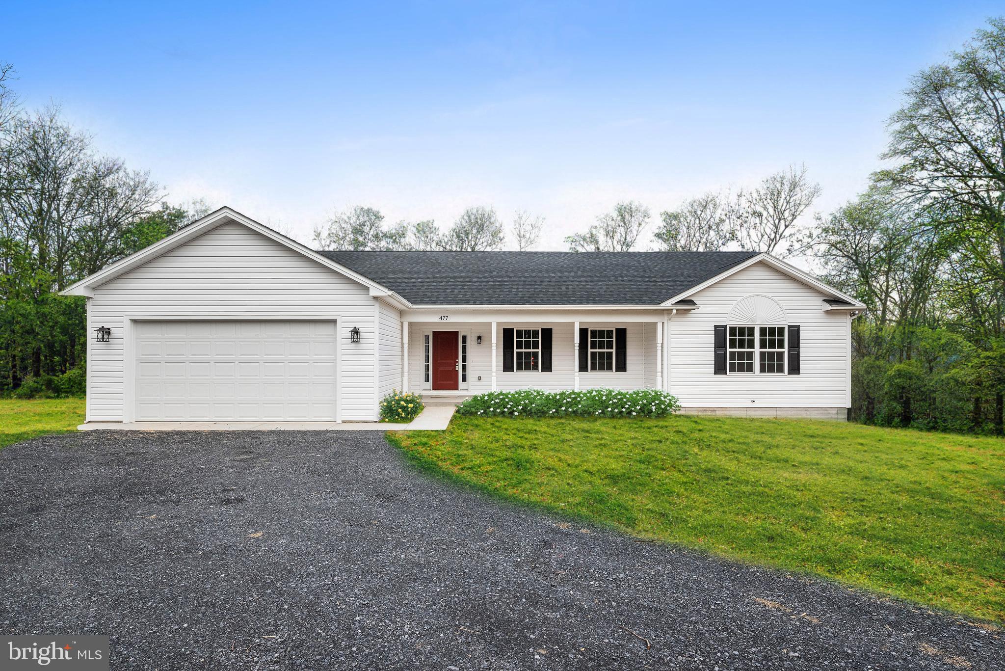 New Price! Move-In Ready Ranch Home on 3.5 Acres!
This stunning, newly completed 2025 ranch home offers the perfect blend of modern comfort and country charm. Featuring 3 bedrooms, 2 full baths, and a full walk-out basement, this home is designed for both relaxation and future possibilities. Step inside to an open floor plan that effortlessly connects the kitchen, living, and dining areas—ideal for entertaining or everyday living. The primary suite boasts a luxurious tiled stand-up shower and a spacious walk-in closet. The upgraded kitchen cabinetry with soft-close doors adds a touch of elegance to your space. With a full unfinished walk-out basement and a 2-car garage, you'll have ample storage and room to expand. Plus, enjoy the privacy and freedom of 3.5 acres—plenty of space to create your dream outdoor retreat. Conveniently located just 20 minutes from Winchester Medical Center and shopping and only 5 minutes from the local country store, this home offers both tranquility and accessibility. Don't miss this incredible opportunity—schedule your showing today!! 
All sizes are approximate.