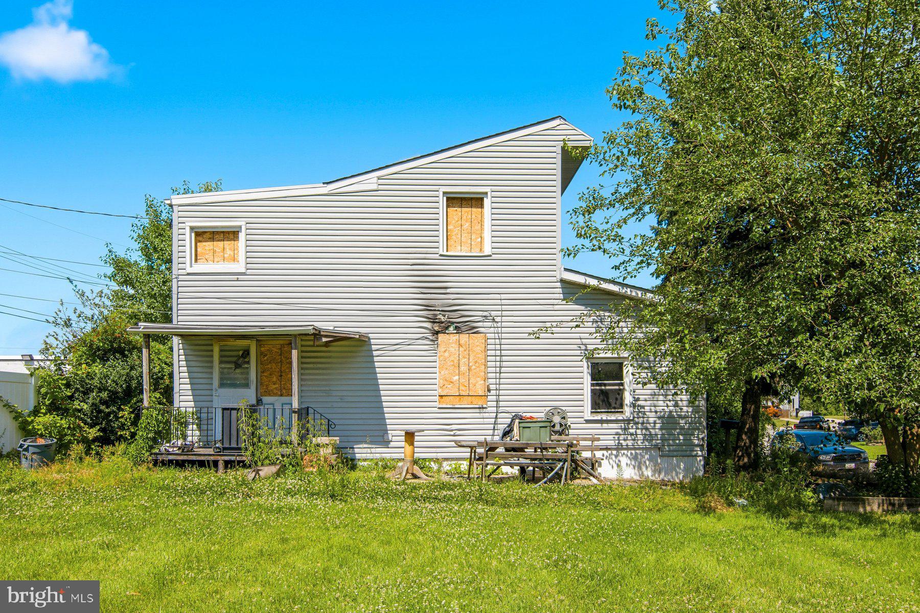 Attention investors, builders, and developers! This property presents a unique opportunity to transform a distressed 7 bedroom asset into a profitable investment. Situated on an improved lot with existing public water, sewer, and utility connections already in place, offering a potential head start for redevelopment or reconstruction. This is an extremely convenient Essex location adjacent to public land for the family to enjoy, and it offers tremendous upside for the right buyer.

Whether your strategy is a full renovation, major reconstruction, or redevelopment project, the potential is here. Existing utilities, established lot, and strong resale values in the surrounding area create a compelling investment opportunity.

Established Essex neighborhood with easy access to local marinas, shopping, and commuter routes. 

Whether you are an investor with a great crew of contractors, a builder looking for a high-profit-margin flip, or a homeowner wanting to design a custom residence without the typical "new build" red tape, this is the perfect and very rare canvas. New construction comps in the Essex Area are selling in the $500-750K range for +/-7 bedroom homes.

Bring your vision, creativity, and contractor—and unlock the potential of this property.