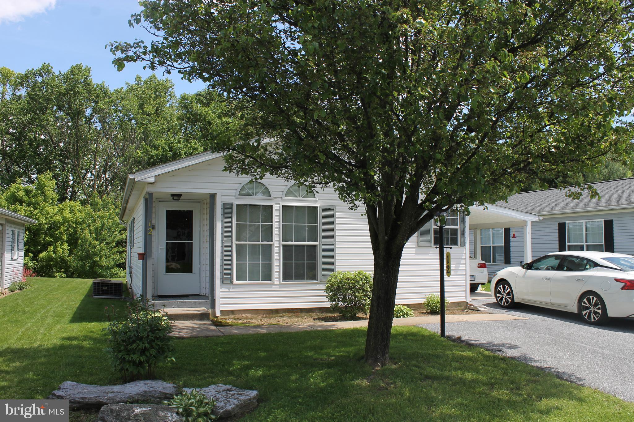 Well maintained 2 bedroom, 2 bath home in over 55 community on rented land.  Nice kitchen with plenty of counter space & eating peninsula.  Master bedroom with private bath including 2 seated stall shower & W/I closet.  Central air, carport & storage room.  Buyers must be approved by management of Westview Terrace.  Rules & Regulations will be provided to review before making any offers.  This is a titled home on rented land.
