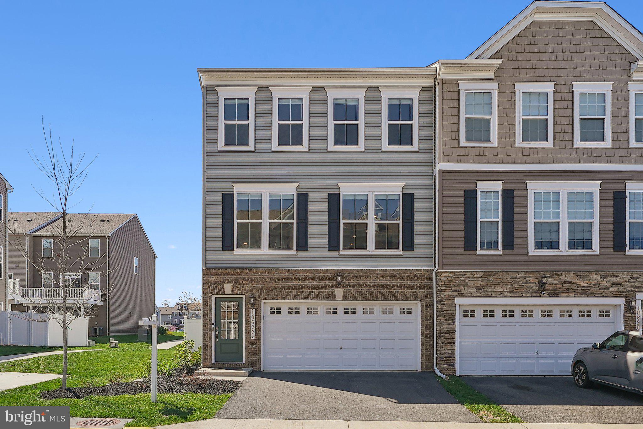 Stunning, Like-New Townhome in Desirable Bradley Square!  Welcome to this gorgeous, three-level end unit townhouse in the highly sought-after Bradley Square community, perfectly positioned in the heart of vibrant Manassas! Built in 2019, this modern masterpiece offers 3 bedrooms, 3.5 baths, and over 2,800 sq. ft. of beautifully designed living space—blending contemporary elegance with everyday comfort.

Step inside to discover sun-drenched interiors and sleek luxury vinyl plank flooring that flows effortlessly throughout the open-concept main level. The gourmet kitchen is a true showstopper, featuring gleaming quartz countertops, a spacious entertainer’s island, dual ovens, stainless steel appliances, and an abundance of cabinetry—making meal prep a breeze. Just off the kitchen, a large private deck invites you to unwind or entertain while overlooking the expansive backyard.

Upstairs, the luxurious primary suite awaits, complete with a generous walk-in closet and a spa-like en suite bathroom. Two additional spacious bedrooms and a full bath provide plenty of room for family and guests. Downstairs, the fully finished lower level offers endless possibilities—perfect for a home office, gym, or recreation room—plus a convenient full bath.

This nearly new home ensures peace of mind with all major systems—including the roof, HVAC, electrical, and windows—in pristine condition. Bradley Square residents enjoy fantastic amenities, including a splash pad, playgrounds, and scenic green spaces. Plus, HOA dues cover trash/recycling and lawn service, so you can enjoy a low-maintenance lifestyle!

Ideally located in Historic Manassas, this home is minutes from Giant, Harris Teeter, Costco, and a variety of shopping and dining hotspots. With easy access to Routes 28, 234, and I-66, commuting is effortless.

Don’t miss this incredible opportunity to own a stunning, move-in ready home in one of Manassas’ most desirable communities! Schedule your private showing today!