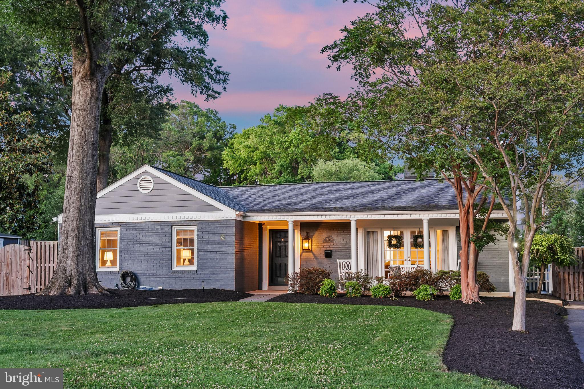 Perfectly situated on a quiet street in sought-after Marlan Forest, this beautifully renovated home offers exceptional one-level living on a rare, flat 0.35-acre lot with an incredible private backyard retreat. Thoughtfully updated throughout, the home seamlessly blends timeless charm with modern comfort and effortless indoor-outdoor living. The stunning renovated kitchen was thoughtfully expanded and opened to the main living areas, featuring a large center island, white cabinetry, stainless steel appliances, and a matching bar area with additional cabinetry and counter space complete with beverage and wine refrigerators — seamlessly connecting the living and entertaining spaces. The inviting living room centers around a gas fireplace and opens through French doors to the charming front porch, creating a warm and welcoming atmosphere. At the rear of the home, the family room and dining area are surrounded by oversized windows that beautifully frame views of the backyard and fill the space with natural light. The main level features three spacious bedrooms and two beautifully renovated full baths. The walk-out lower level offers exceptional versatility, complete with a generous family room and third full bath, offering flexibility for a private fourth bedroom/guest suite. Ample storage and dedicated laundry space further enhance the home’s thoughtful functionality.  The backyard is truly extraordinary — a resort-inspired outdoor oasis designed for year-round enjoyment. The fully fenced grounds feature an in-ground heated saltwater pool, separate above-ground hot tub, expansive flat green space, and meticulously manicured landscaping and hardscaping, creating a serene and private setting that feels like a personal retreat.
Significant recent improvements include: completely renovated and expanded kitchen (2024), remodeled the lower-level (2024), installed mini-split system (2024), replaced main HVAC system (2025), top to bottom primary bath renovation (2026), added storage shed (2023), heated saltwater pool installation (2023), and above ground hot tub (2023).  Just a short drive to Hollin Hall or Belle View shopping centers for local grocery, convenience stores, restaurants and more. Enjoy living near the George Washington Parkway with easy access to bike trail, parks, and convenient commuting to Washington, D.C., the Pentagon, Old Town Alexandria, and National Airport.